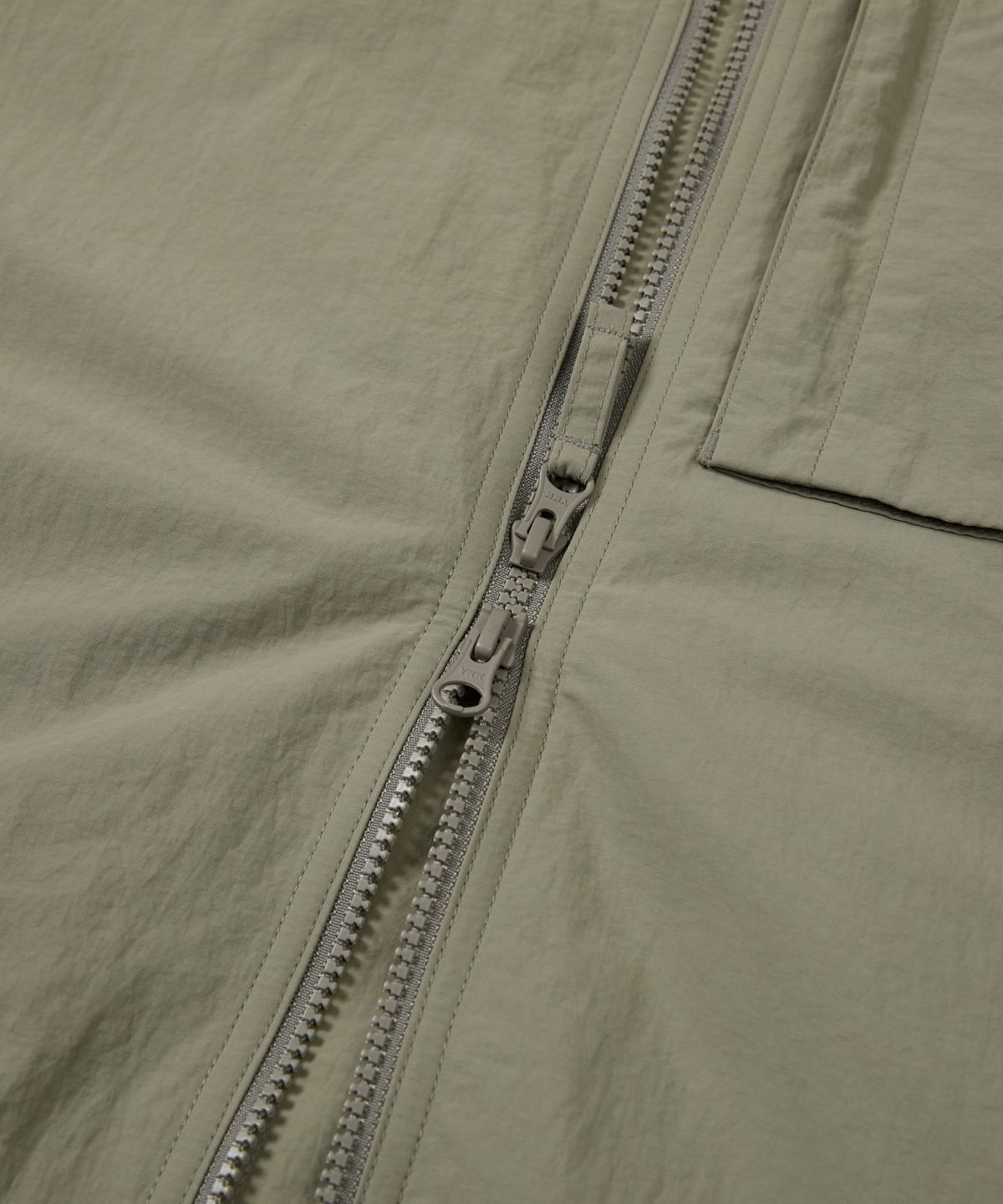 스노우피크 어패럴(SNOWPEAK APPAREL) 캠플 포켓 바람막이 (S24FMCWB12) Khaki Gray