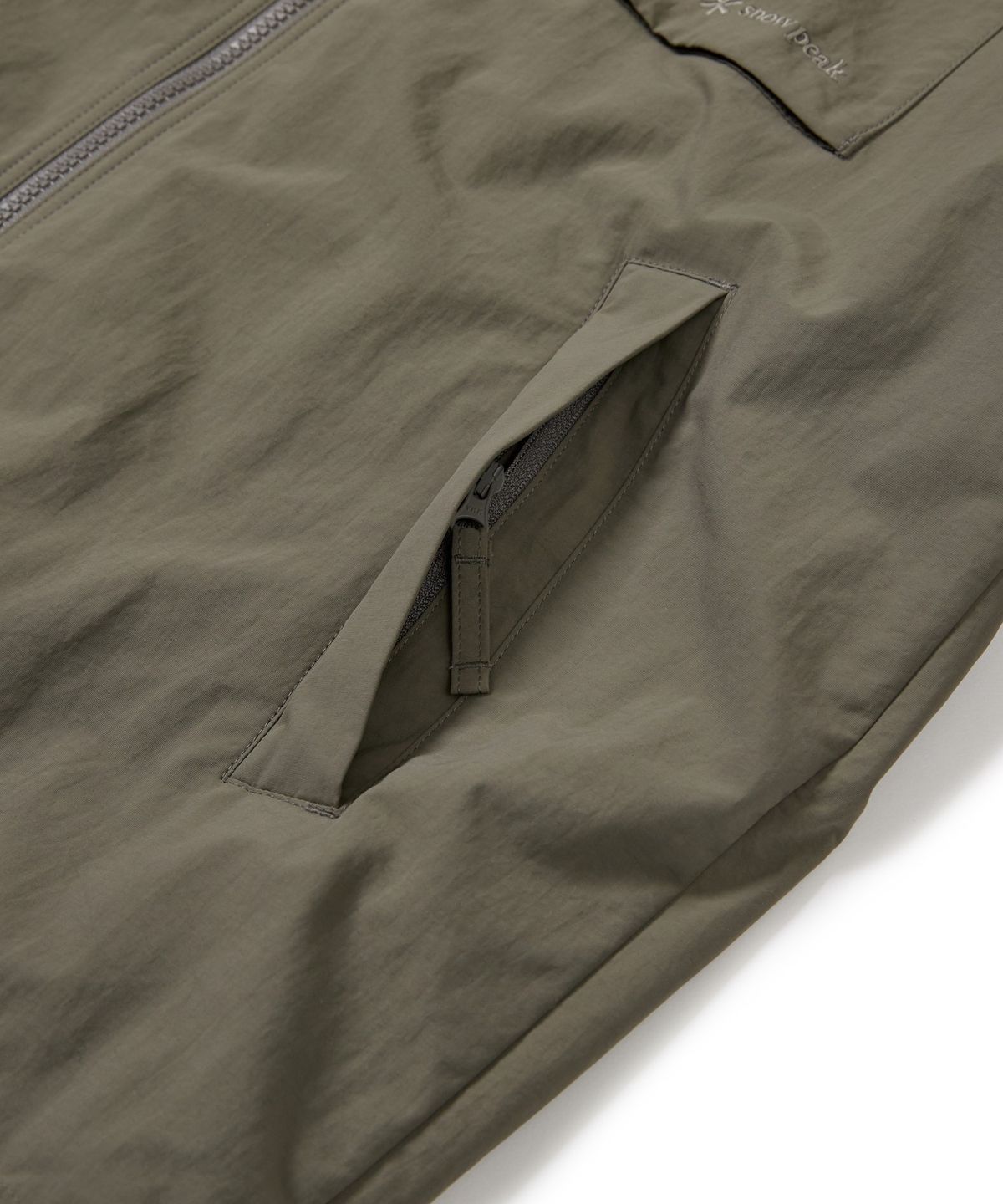 스노우피크 어패럴(SNOWPEAK APPAREL) 캠플 포켓 바람막이 (S24FMCWB12) Dark Khaki