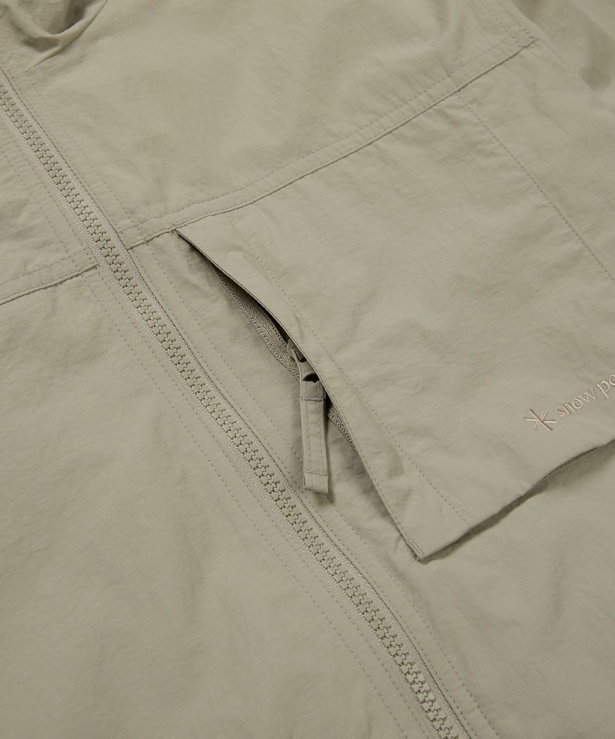 스노우피크 어패럴(SNOWPEAK APPAREL) 캠플 포켓 바람막이 (S24FMCWB12) Beige Gray