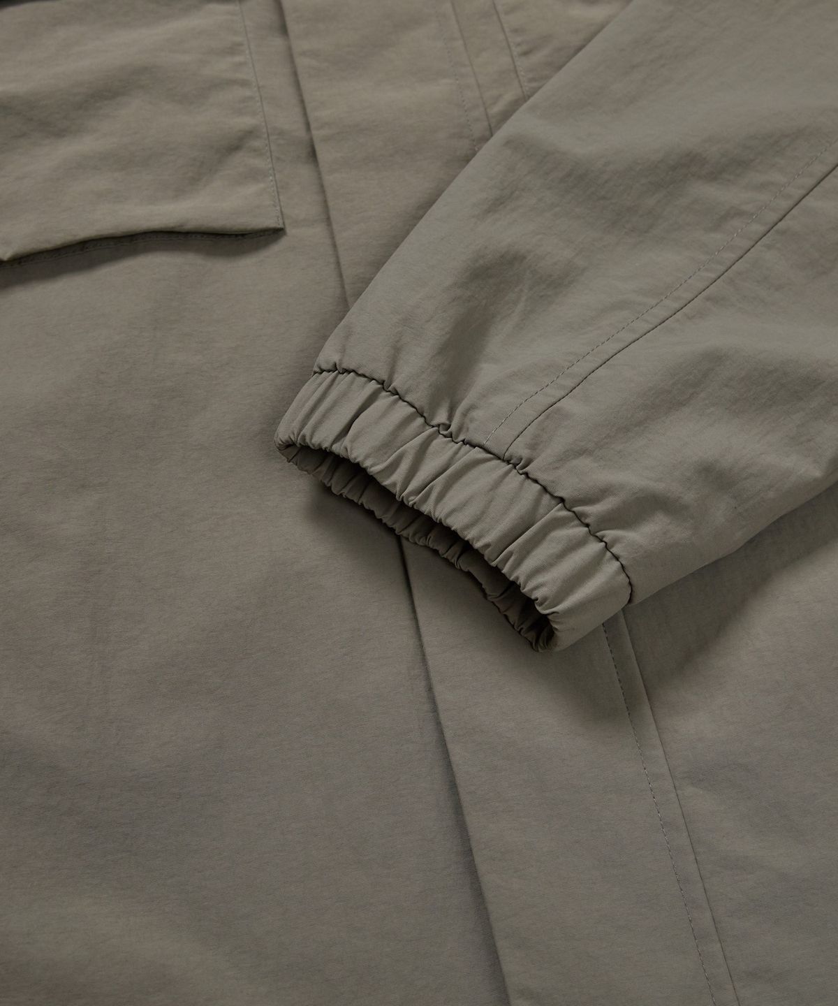 스노우피크 어패럴(SNOWPEAK APPAREL) 캠플 스탠드넥 바람막이 (S24FMCWB14) Dark Khaki