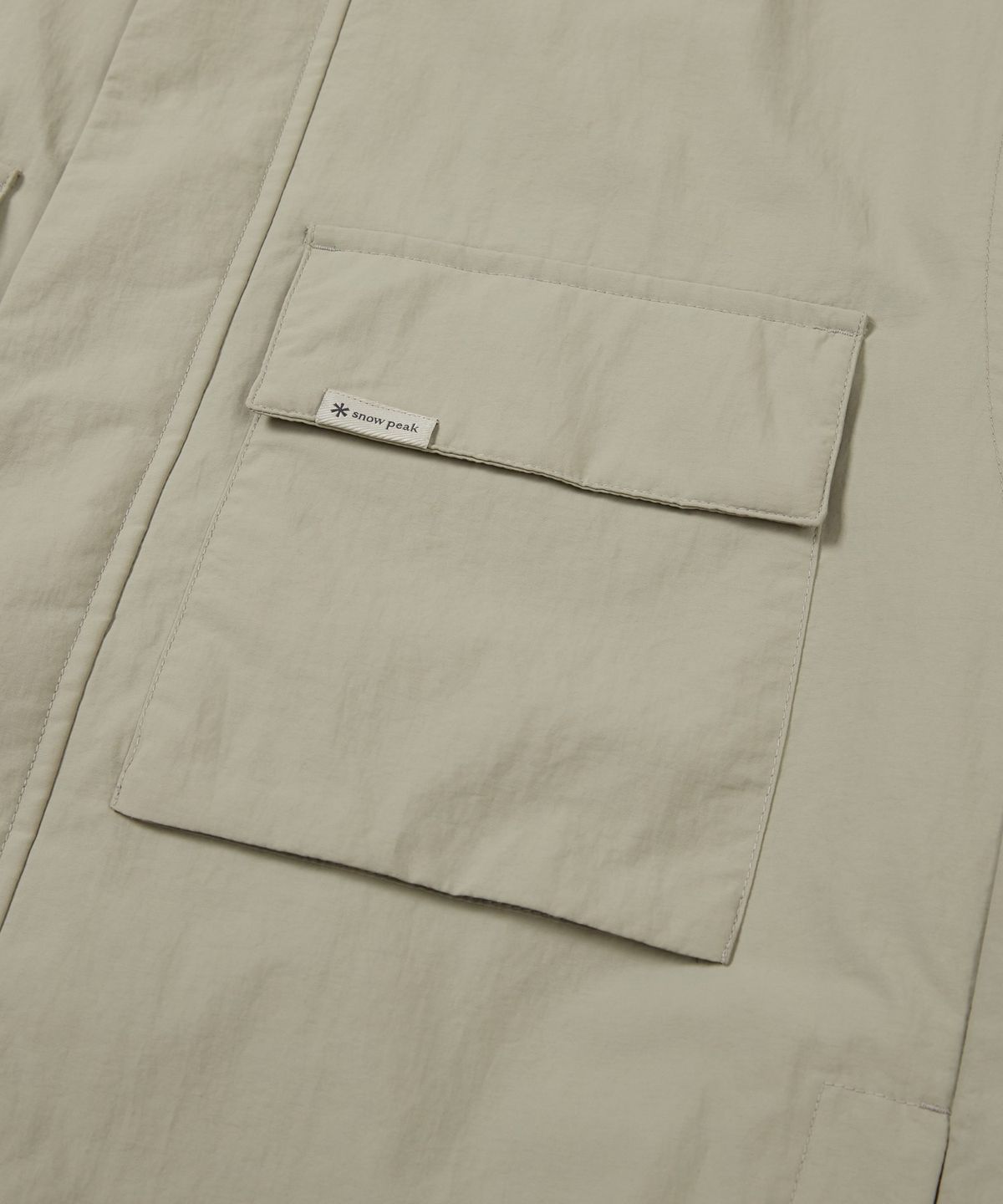 스노우피크 어패럴(SNOWPEAK APPAREL) 캠플 스탠드넥 바람막이 (S24FMCWB14) Beige Gray