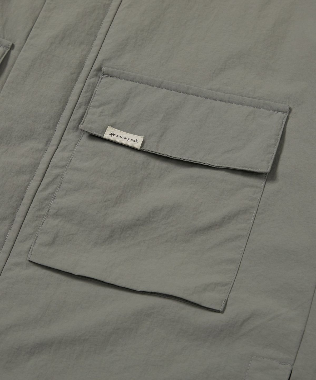스노우피크 어패럴(SNOWPEAK APPAREL) 캠플 스탠드넥 바람막이 (S24FMCWB14) Dark Gray