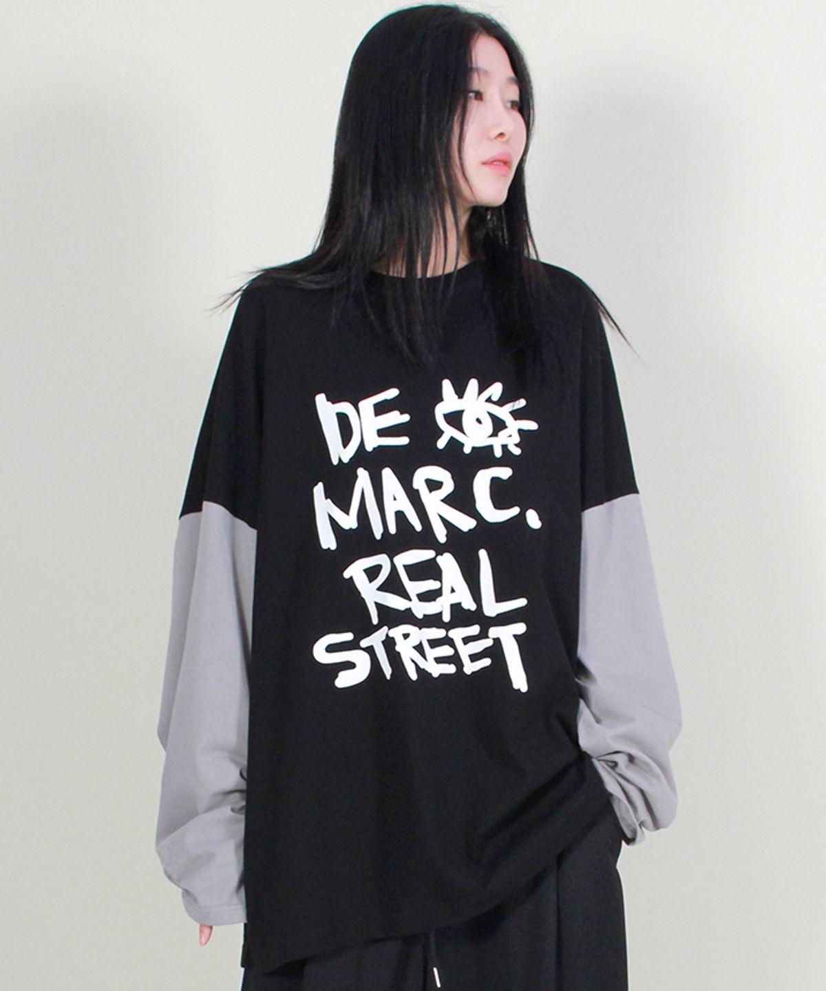 드마크(DEMARC) 오버핏 리얼스트릿 텍스트 긴팔 티셔츠 블랙