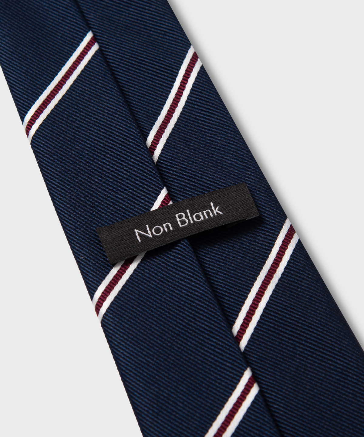 넌블랭크(NONBLANK) 실크 100 레지멘탈 타이_NAVY