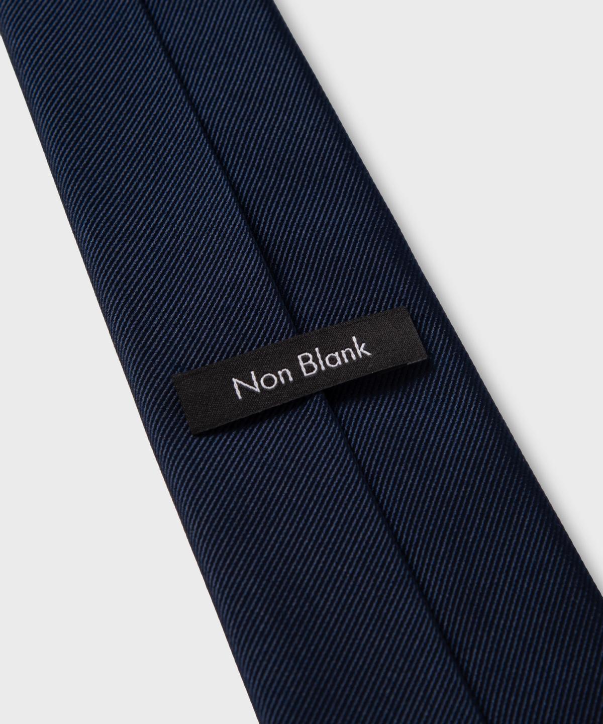 넌블랭크(NONBLANK) 실크 100 솔리드 타이_DARK NAVY