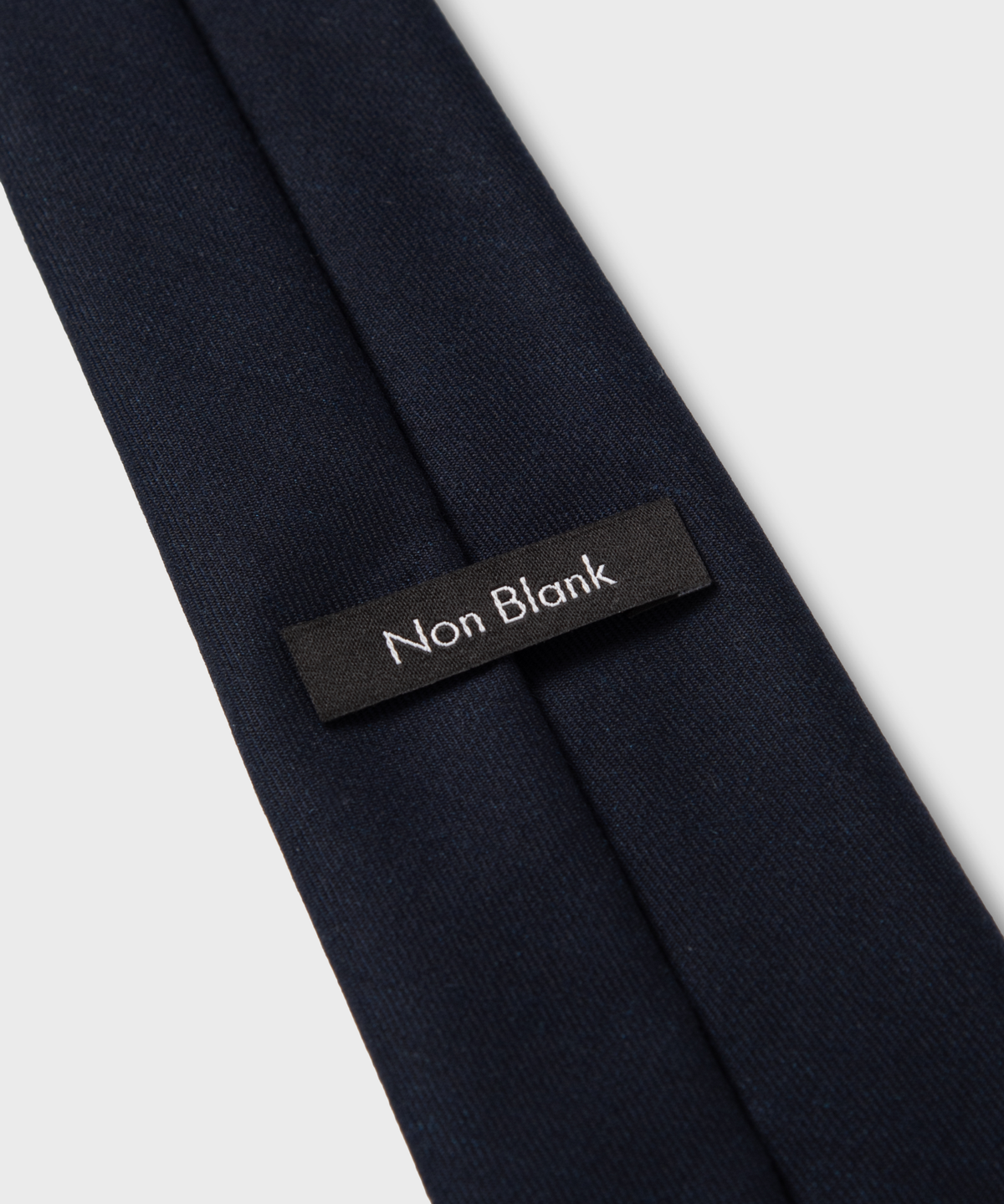 넌블랭크(NONBLANK) 울 100 솔리드 타이_DARK NAVY