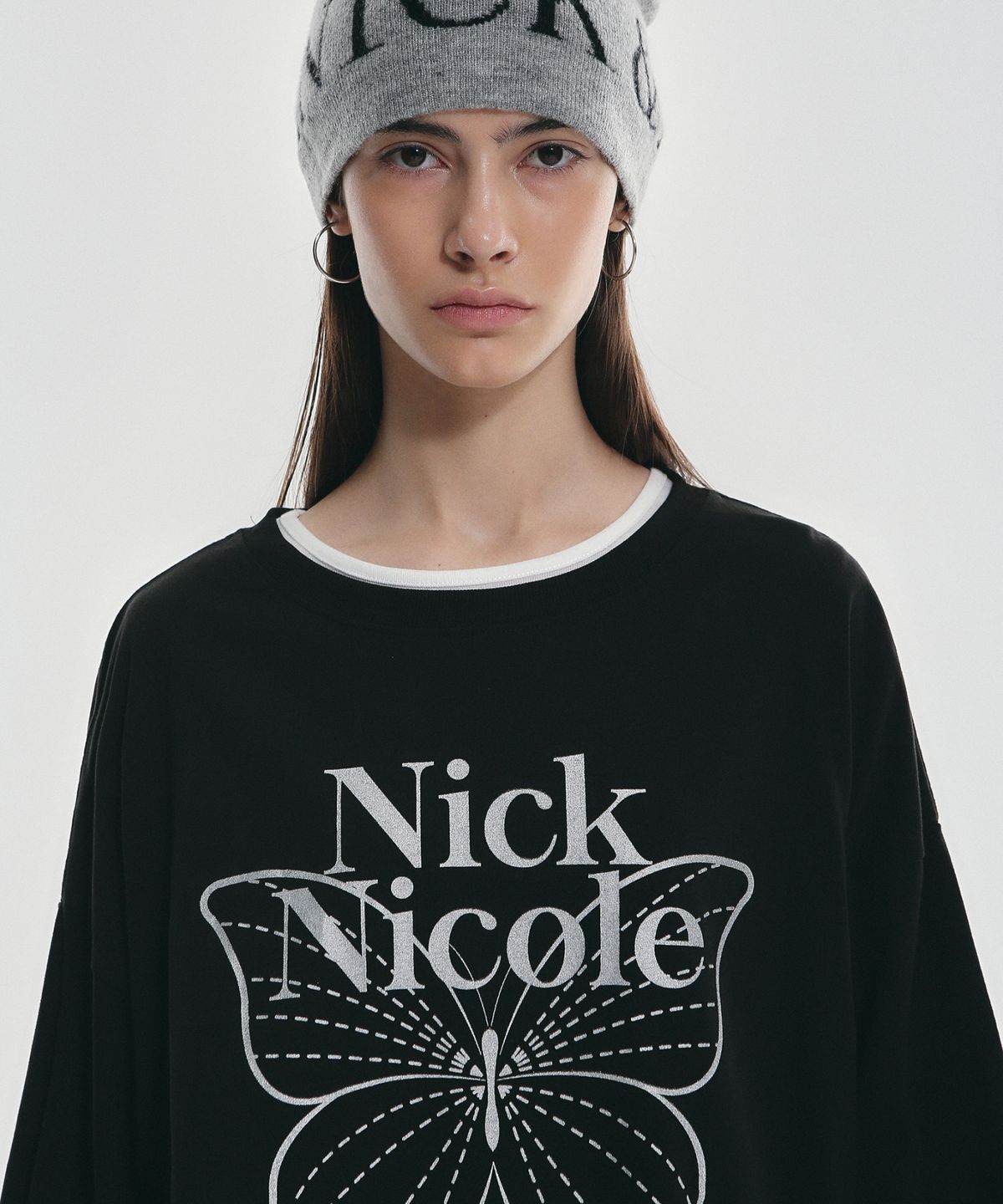 닉앤니콜(NICK&NICOLE) BUTTERFLY SIGNATURE LS TOP_BLACK SILVER