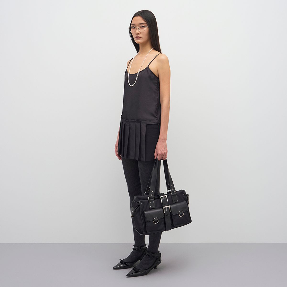 엘씨디씨티엠(LCDC™) UNBALANCED PLEATS SLEEVELESS TOP