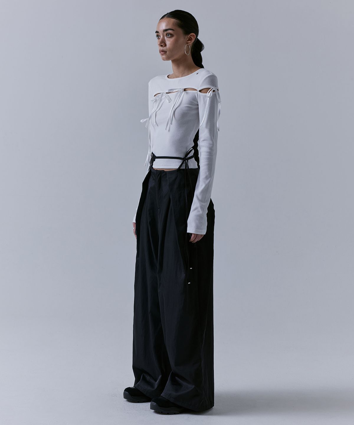 트리밍버드(TREEMINGBIRD) Unbalance Waist Strap Pants [ Black ]