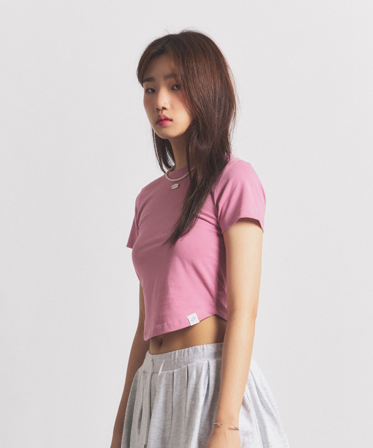닐라이즈(NEALIZE) Round Semi Crop T-Shirt Pink