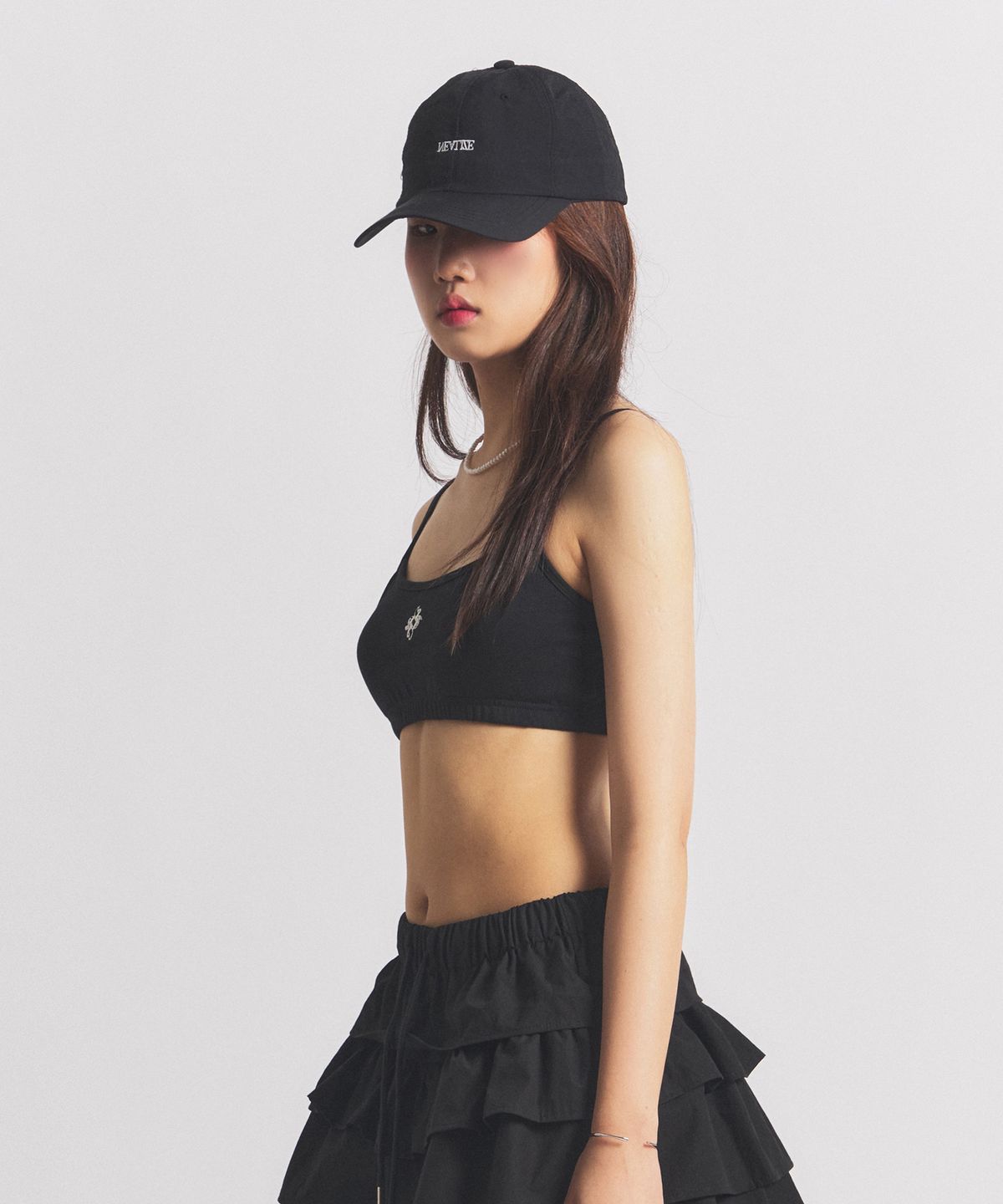 닐라이즈(NEALIZE) Symbol Logo Bra Top Black