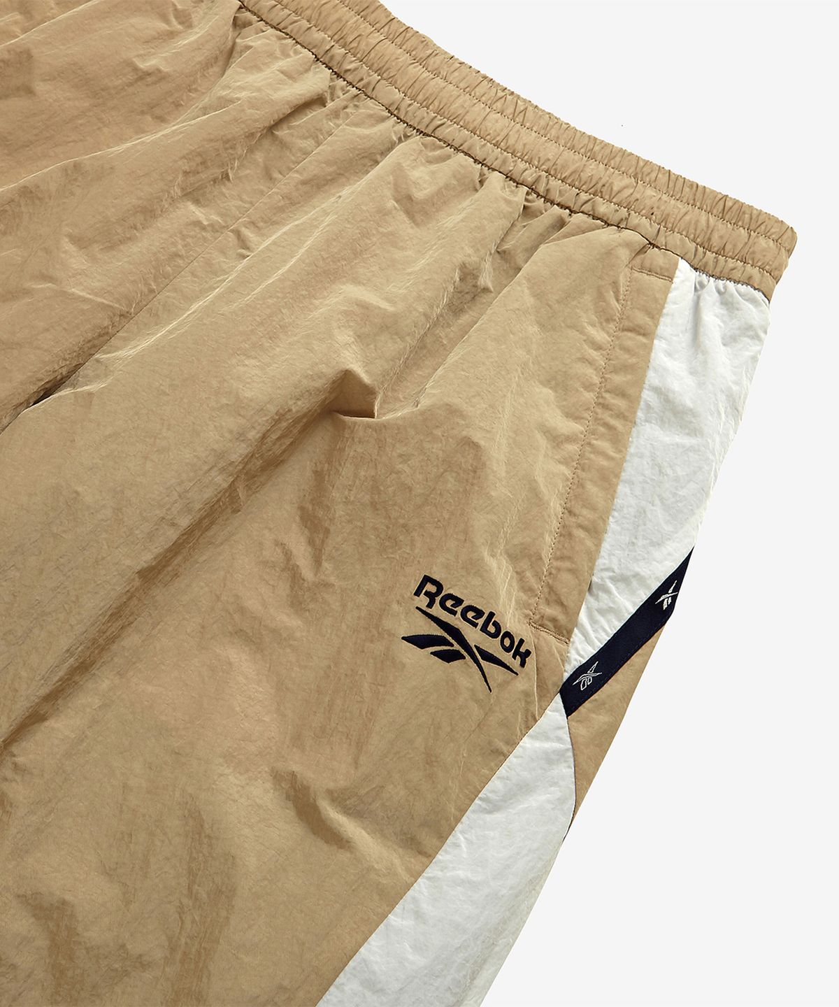 리복(REEBOK) 라이벌 웜업 팬츠 - 베이지