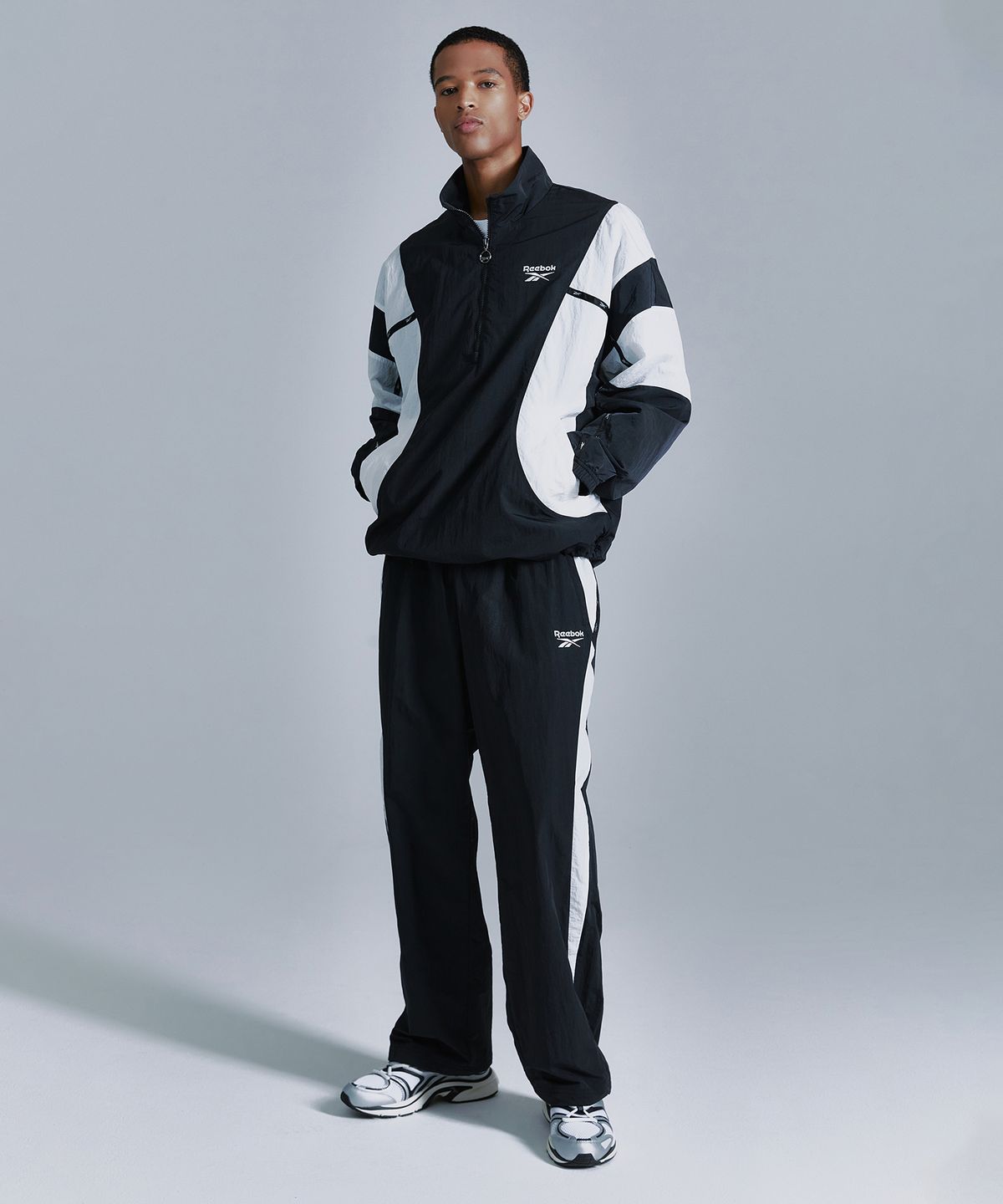 리복(REEBOK) 라이벌 더블 커브 아노락 - 블랙