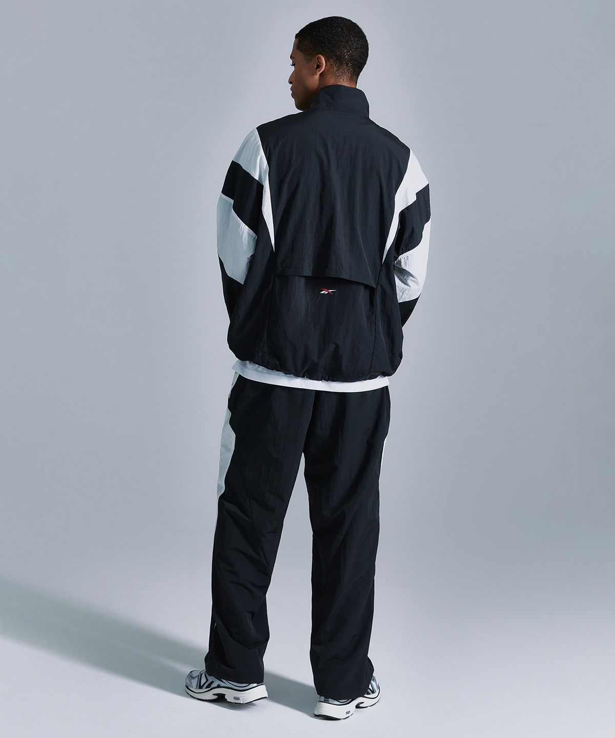 리복(REEBOK) 라이벌 더블 커브 아노락 - 블랙