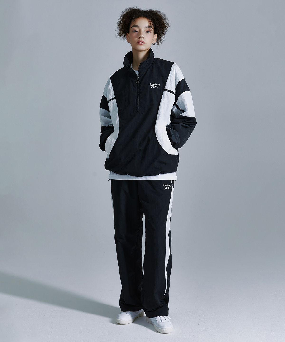 리복(REEBOK) 라이벌 더블 커브 아노락 - 블랙
