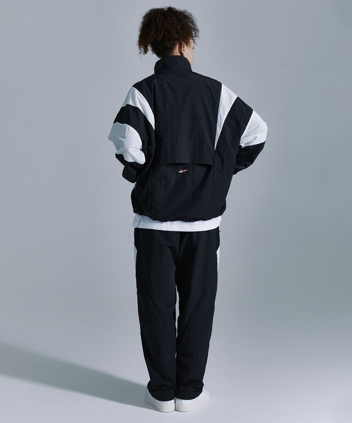 리복(REEBOK) 라이벌 더블 커브 아노락 - 블랙