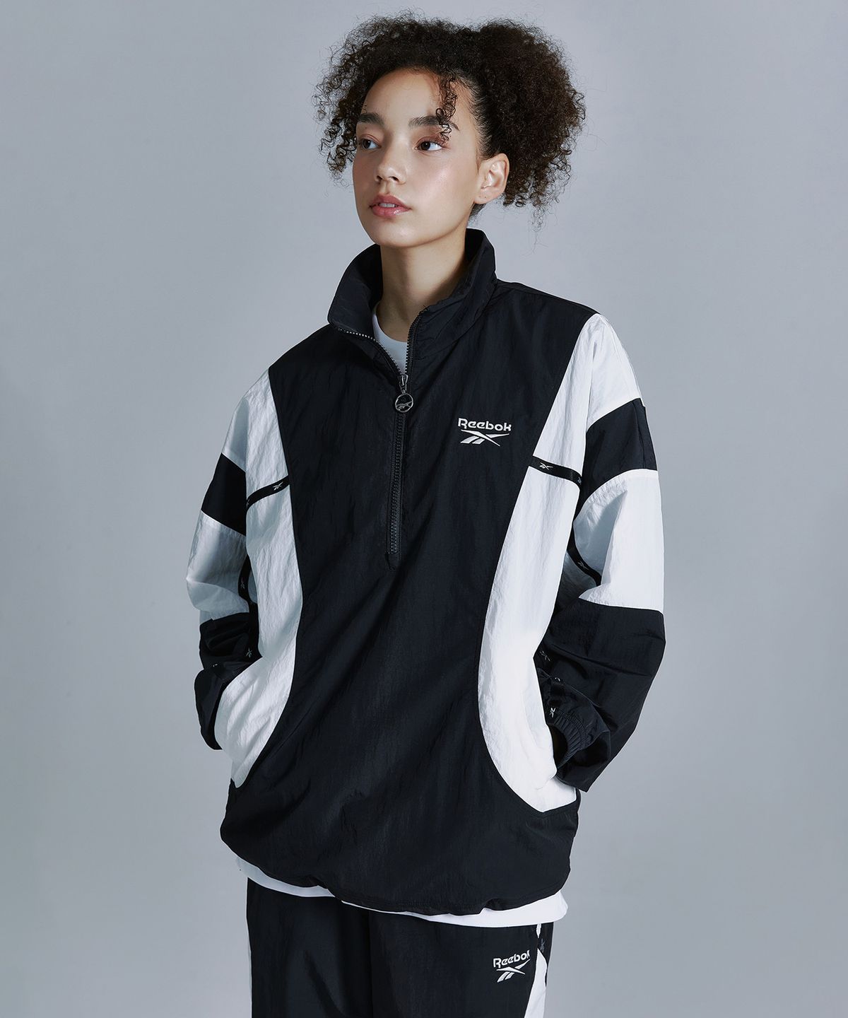 리복(REEBOK) 라이벌 더블 커브 아노락 - 블랙