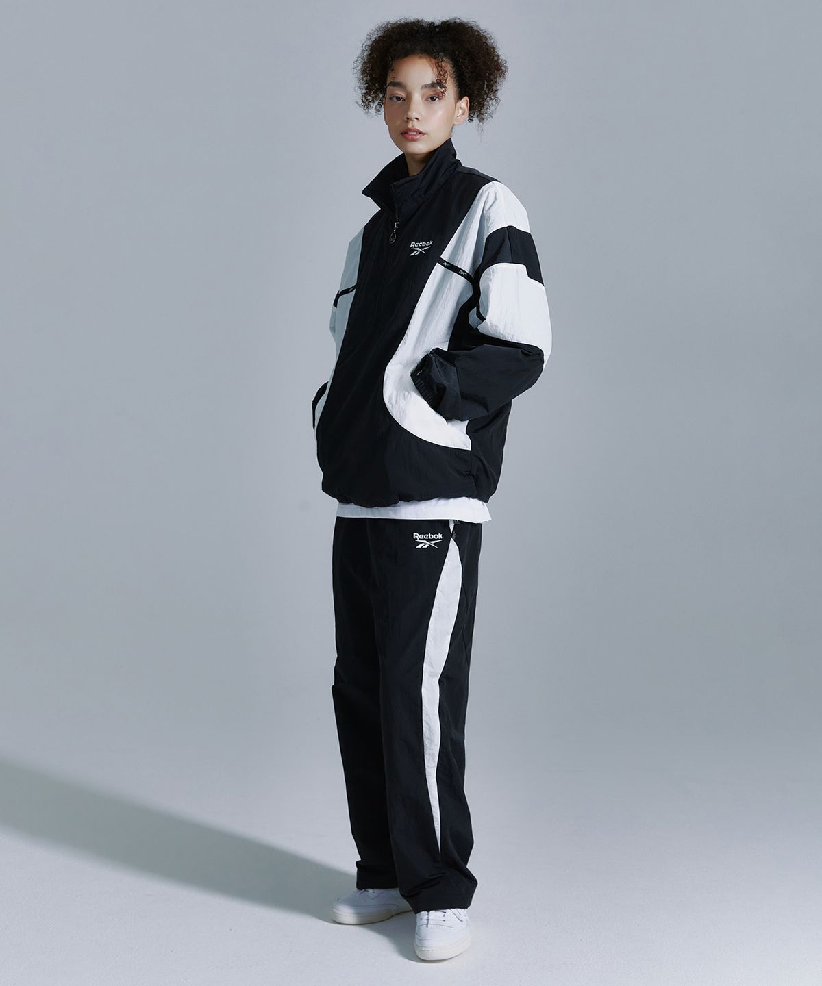 리복(REEBOK) 라이벌 더블 커브 아노락 - 블랙