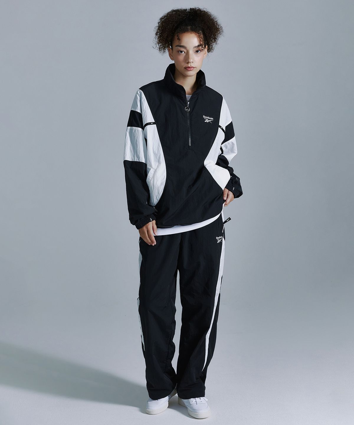 리복(REEBOK) 라이벌 더블 커브 아노락 - 블랙