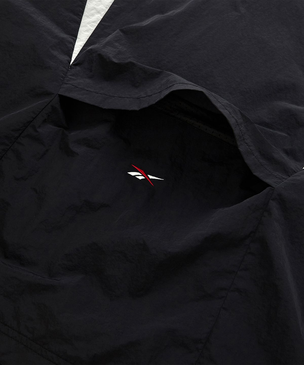 리복(REEBOK) 라이벌 더블 커브 아노락 - 블랙