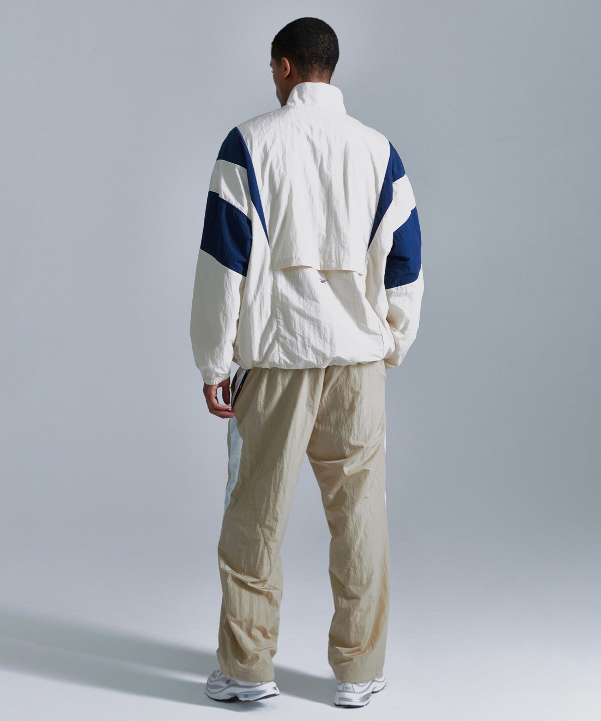 리복(REEBOK) 라이벌 더블 커브 아노락 - 베이지