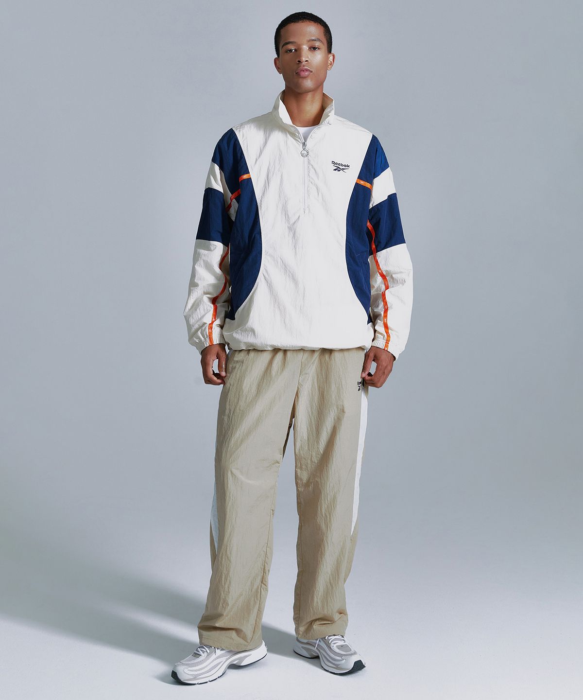 리복(REEBOK) 라이벌 더블 커브 아노락 - 베이지