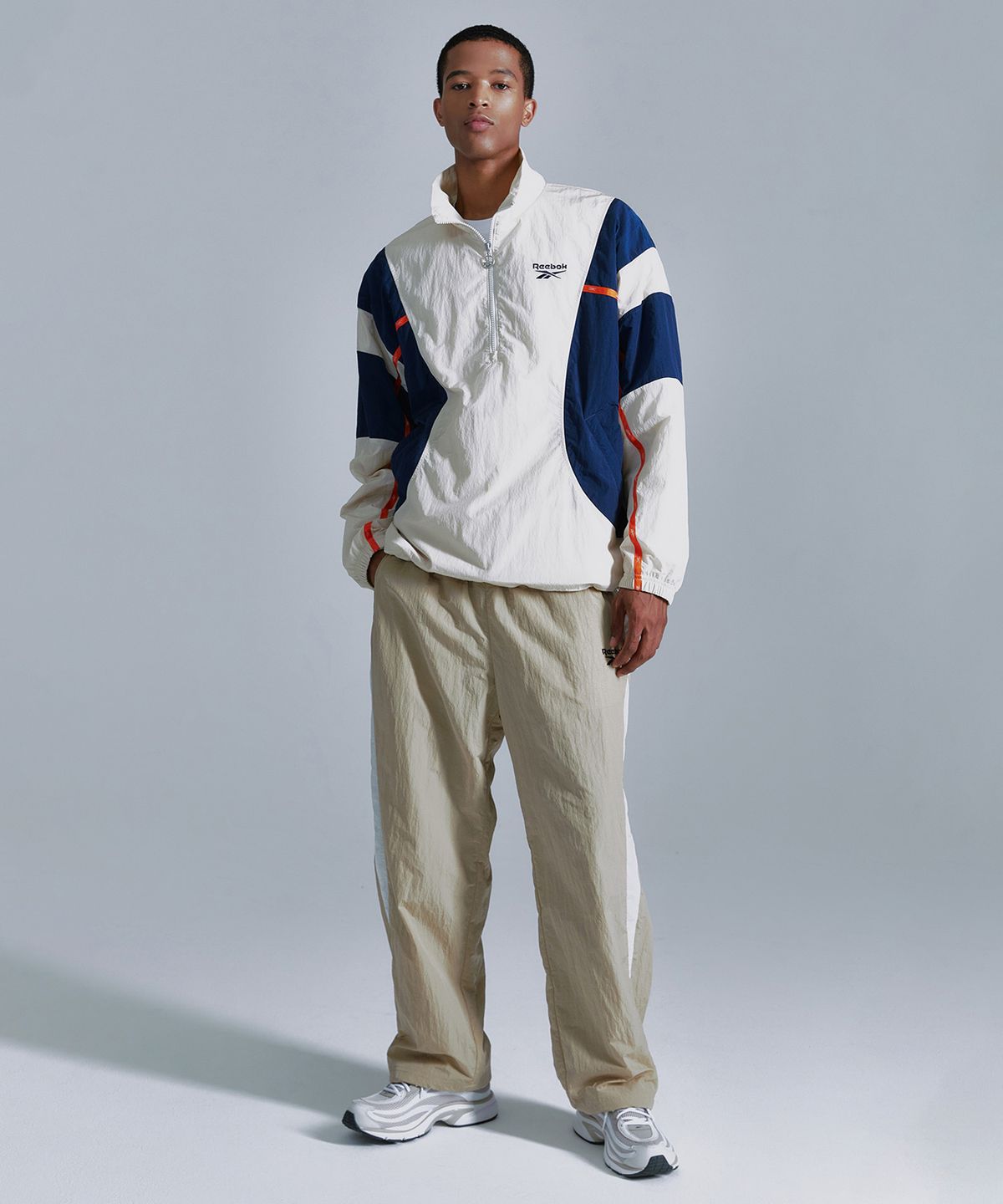리복(REEBOK) 라이벌 더블 커브 아노락 - 베이지