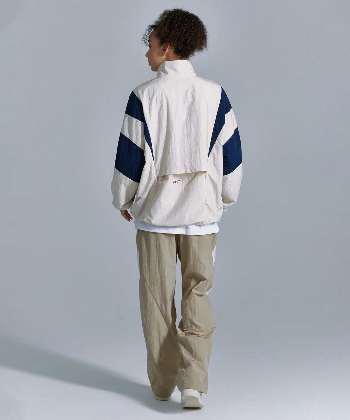 리복(REEBOK) 라이벌 더블 커브 아노락 - 베이지