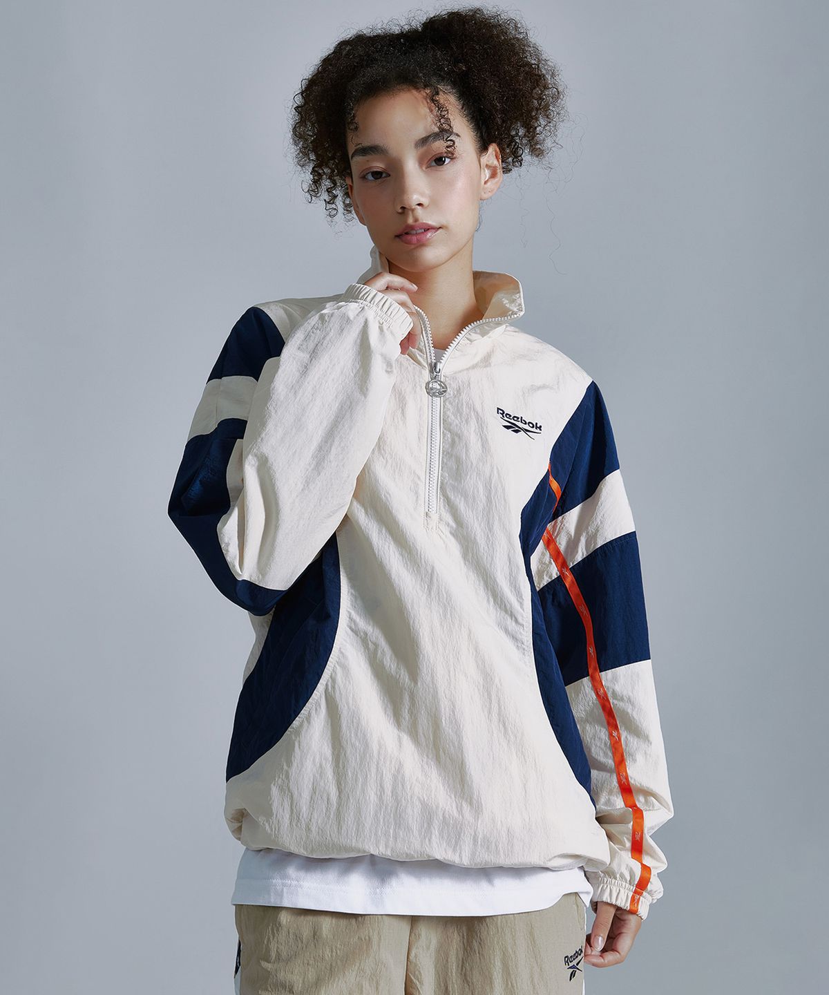리복(REEBOK) 라이벌 더블 커브 아노락 - 베이지