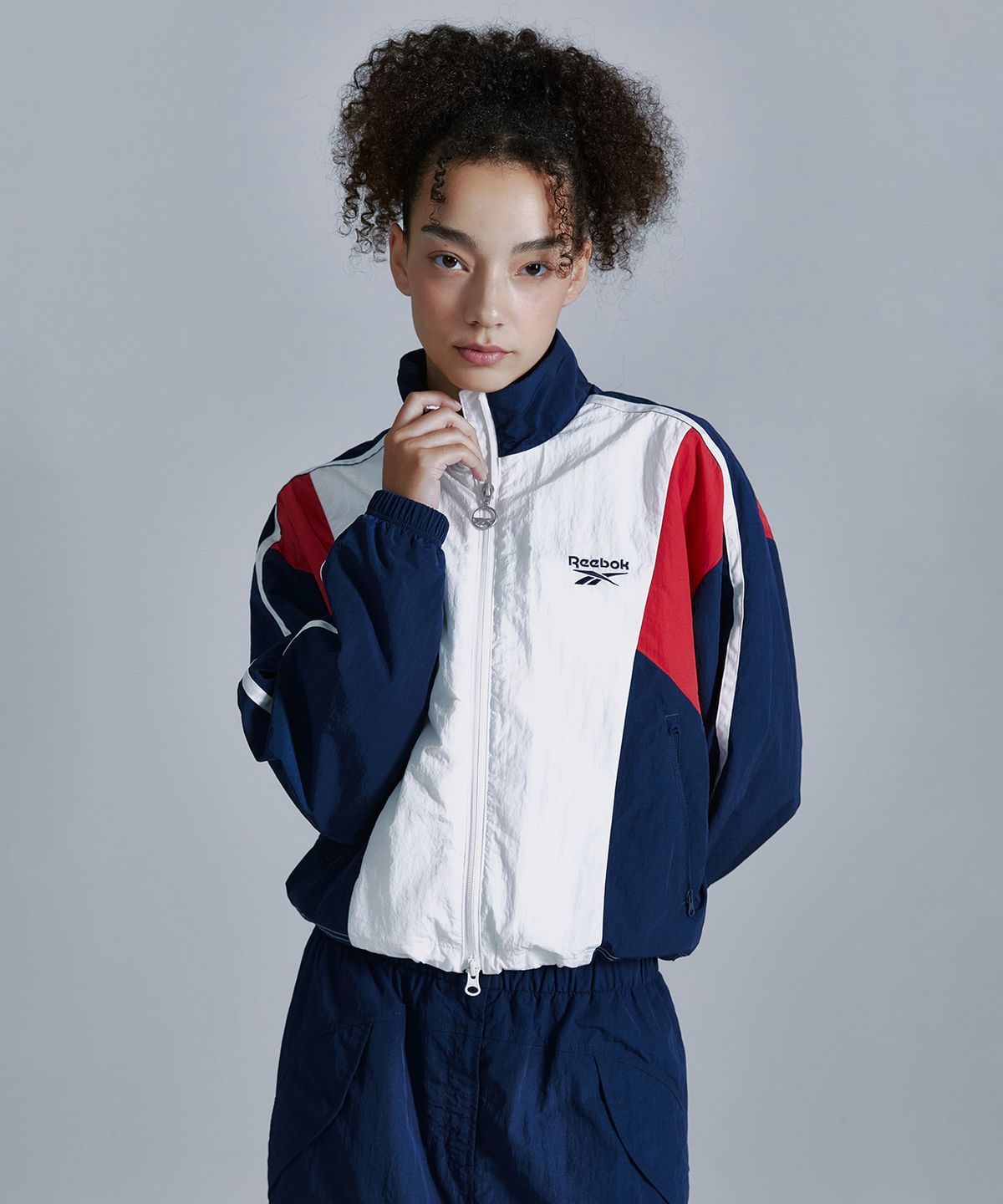 리복(REEBOK) 라이벌 크롭 윈드 브레이커 (W) - 화이트
