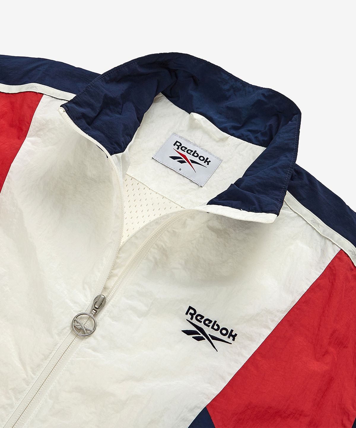 리복(REEBOK) 라이벌 크롭 윈드 브레이커 (W) - 화이트