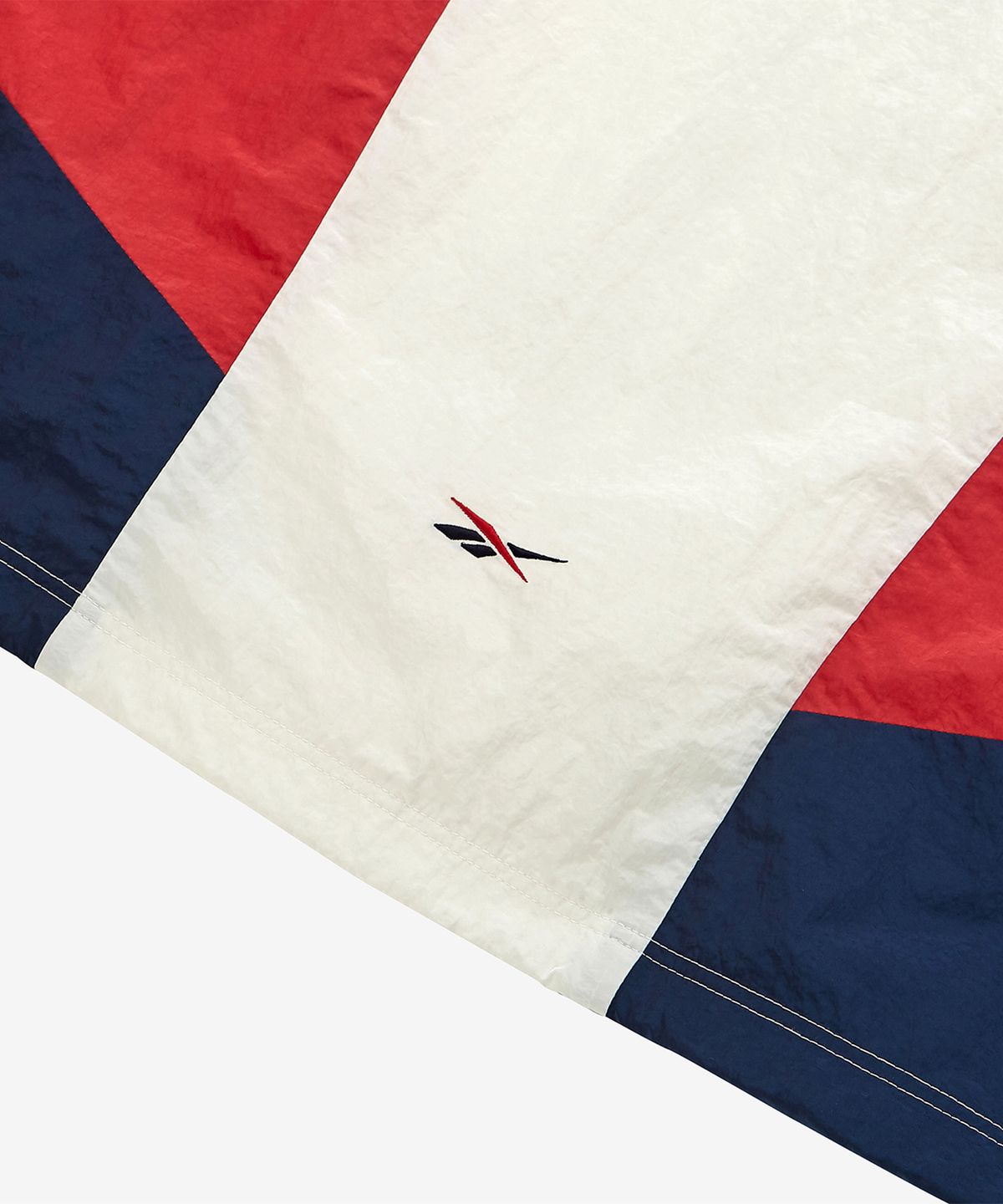 리복(REEBOK) 라이벌 크롭 윈드 브레이커 (W) - 화이트