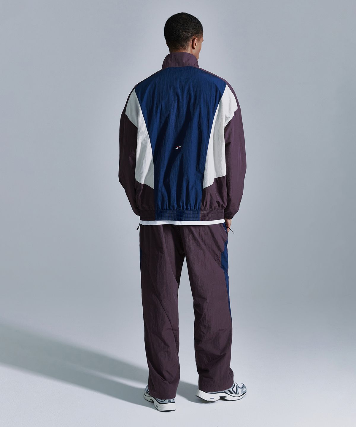 리복(REEBOK) 라이벌 윈드 브레이커 - 네이비