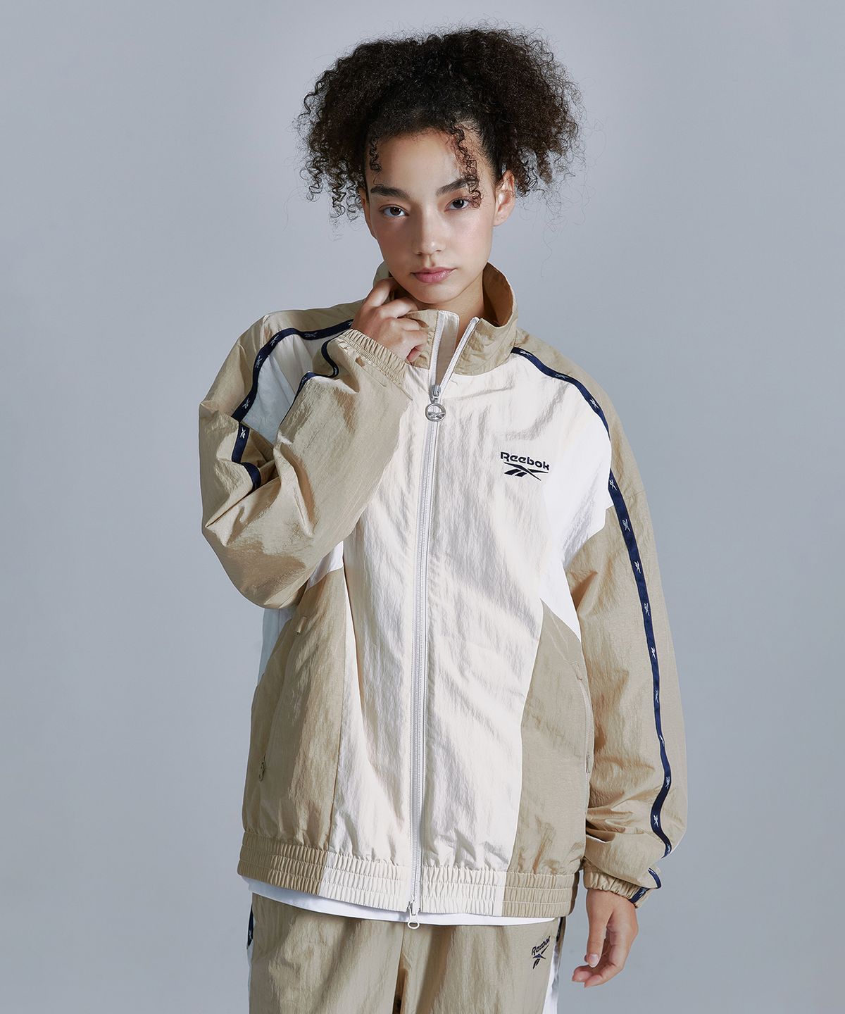 리복(REEBOK) 라이벌 윈드 브레이커 - 베이지
