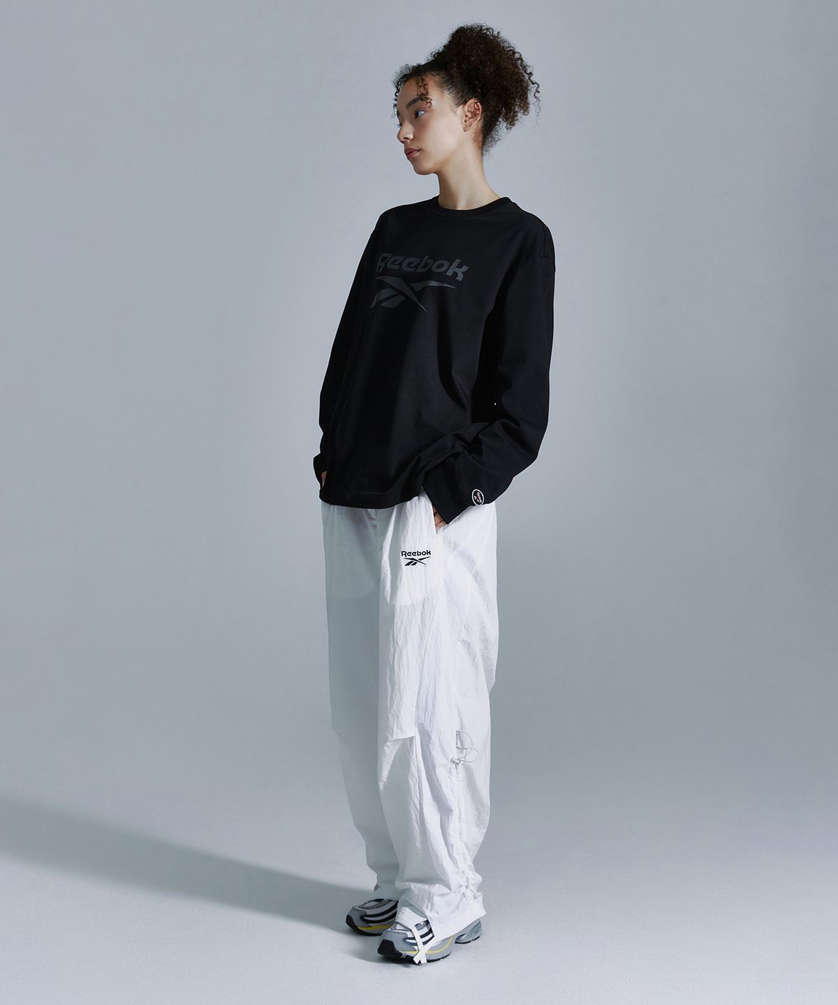 리복(REEBOK) 벡터 아카이브 롱슬리브 - 블랙