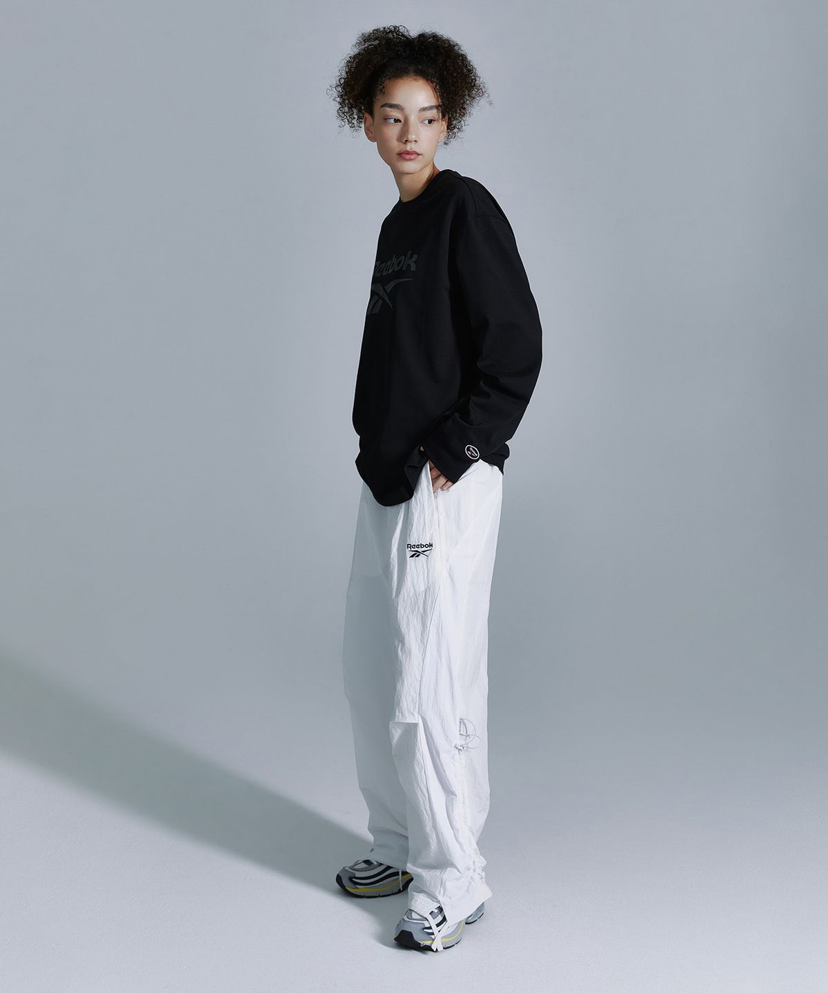 리복(REEBOK) 벡터 아카이브 롱슬리브 - 블랙