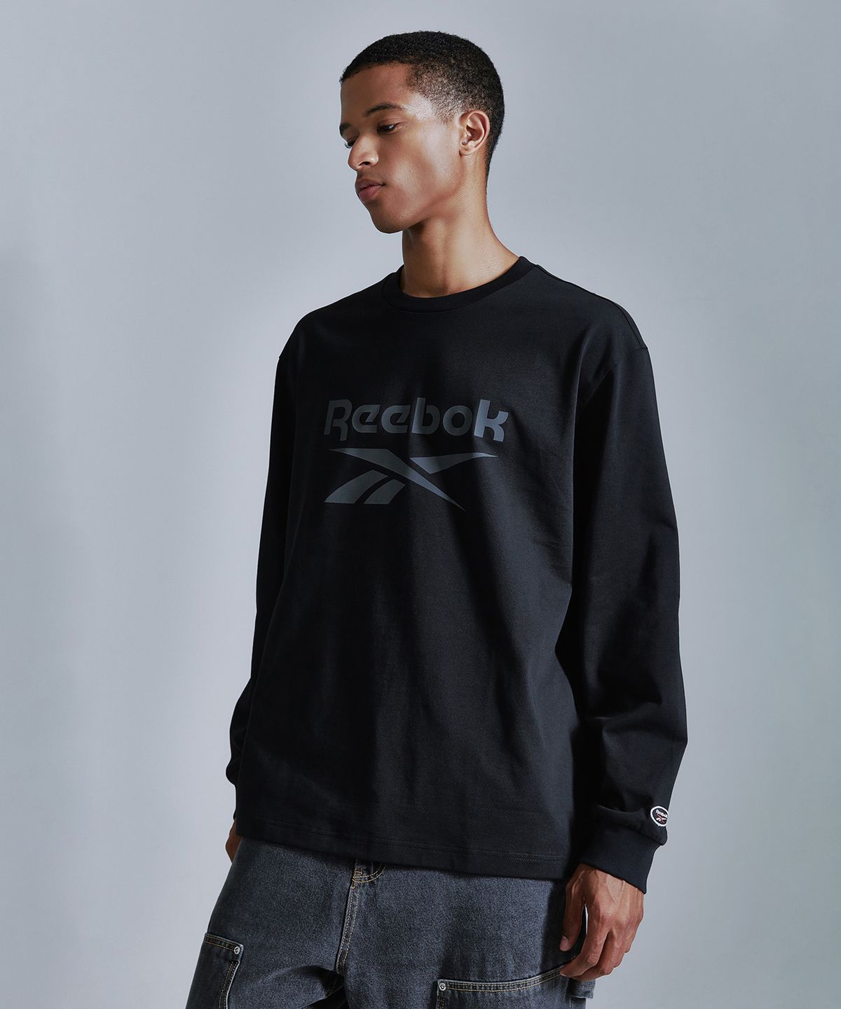 리복(REEBOK) 벡터 아카이브 롱슬리브 - 블랙
