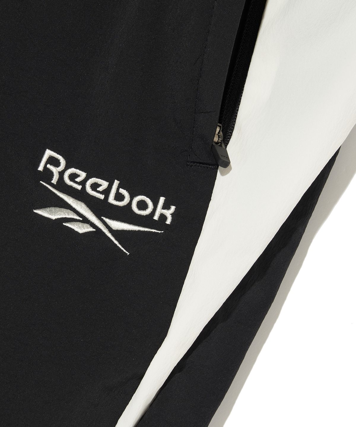리복(REEBOK) 플로우 웜업 조거 팬츠 - 블랙