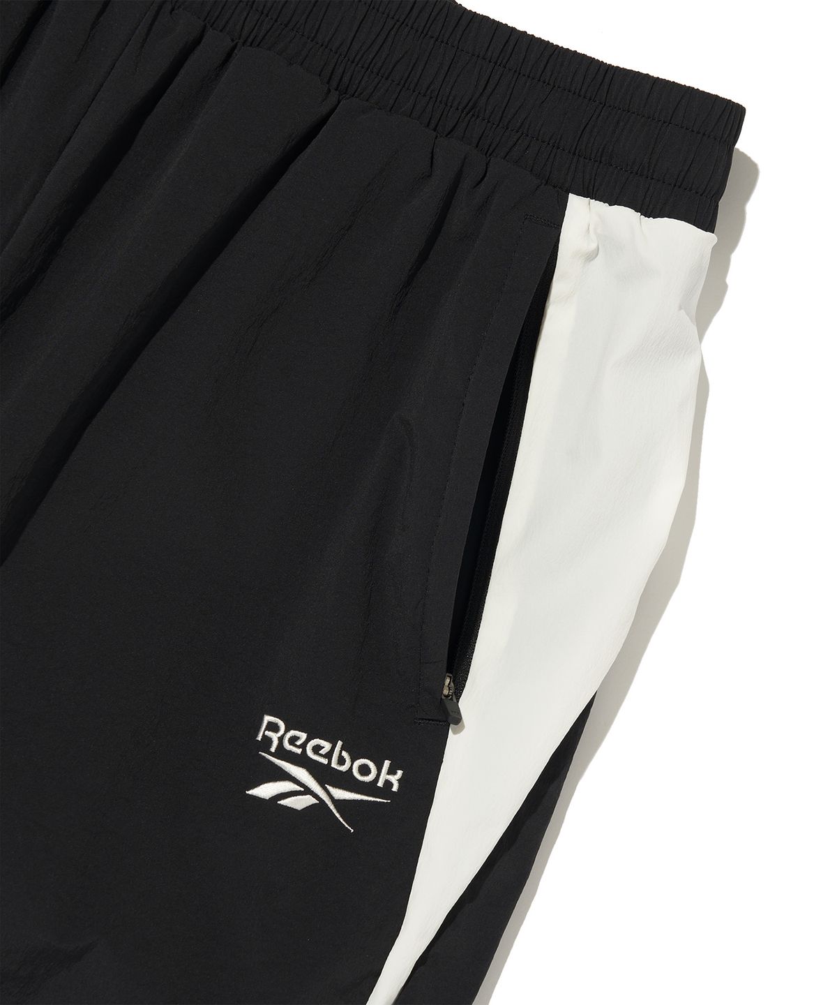 리복(REEBOK) 플로우 웜업 조거 팬츠 - 블랙