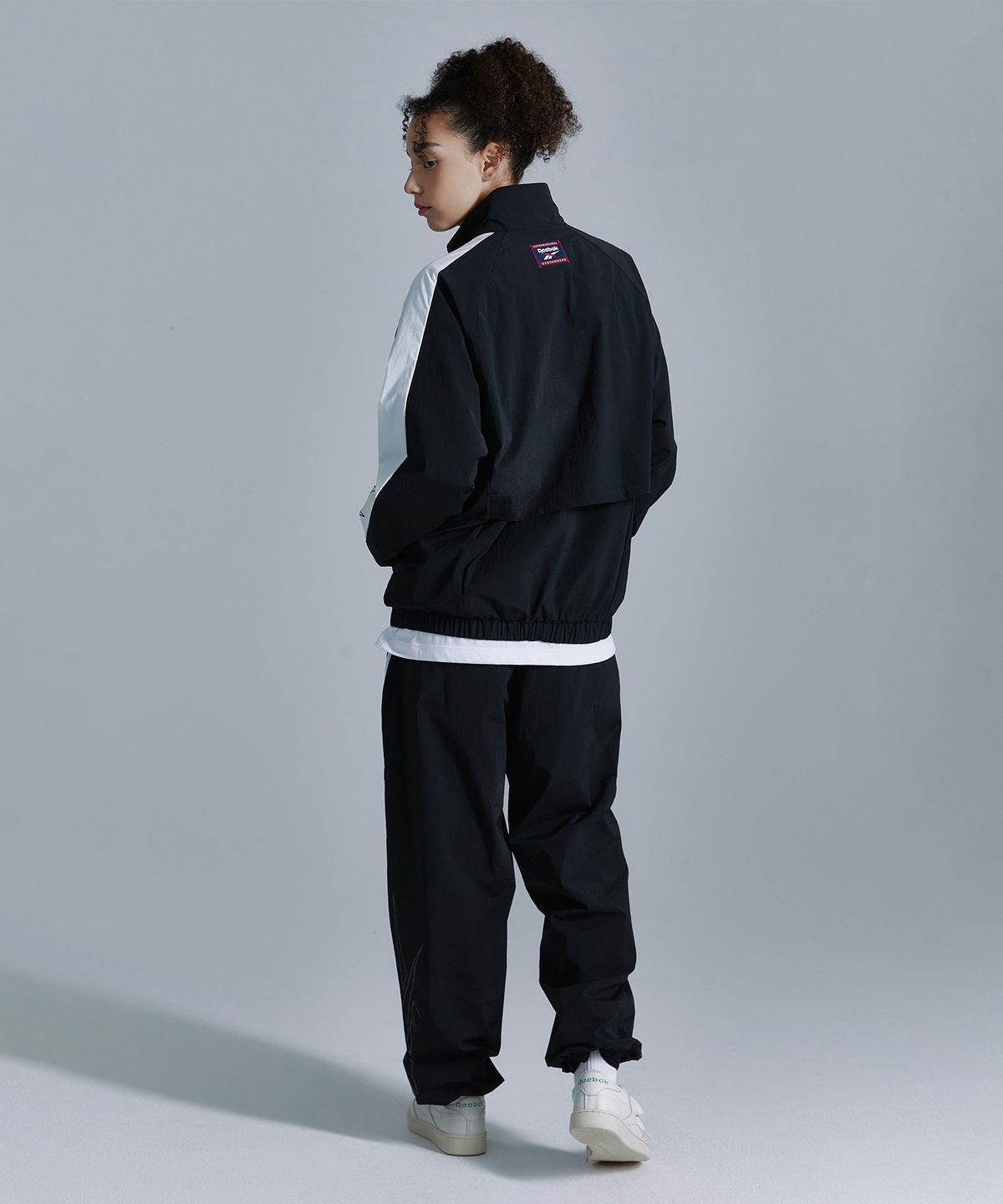 리복(REEBOK) 플로우 웜업 조거 팬츠 - 블랙
