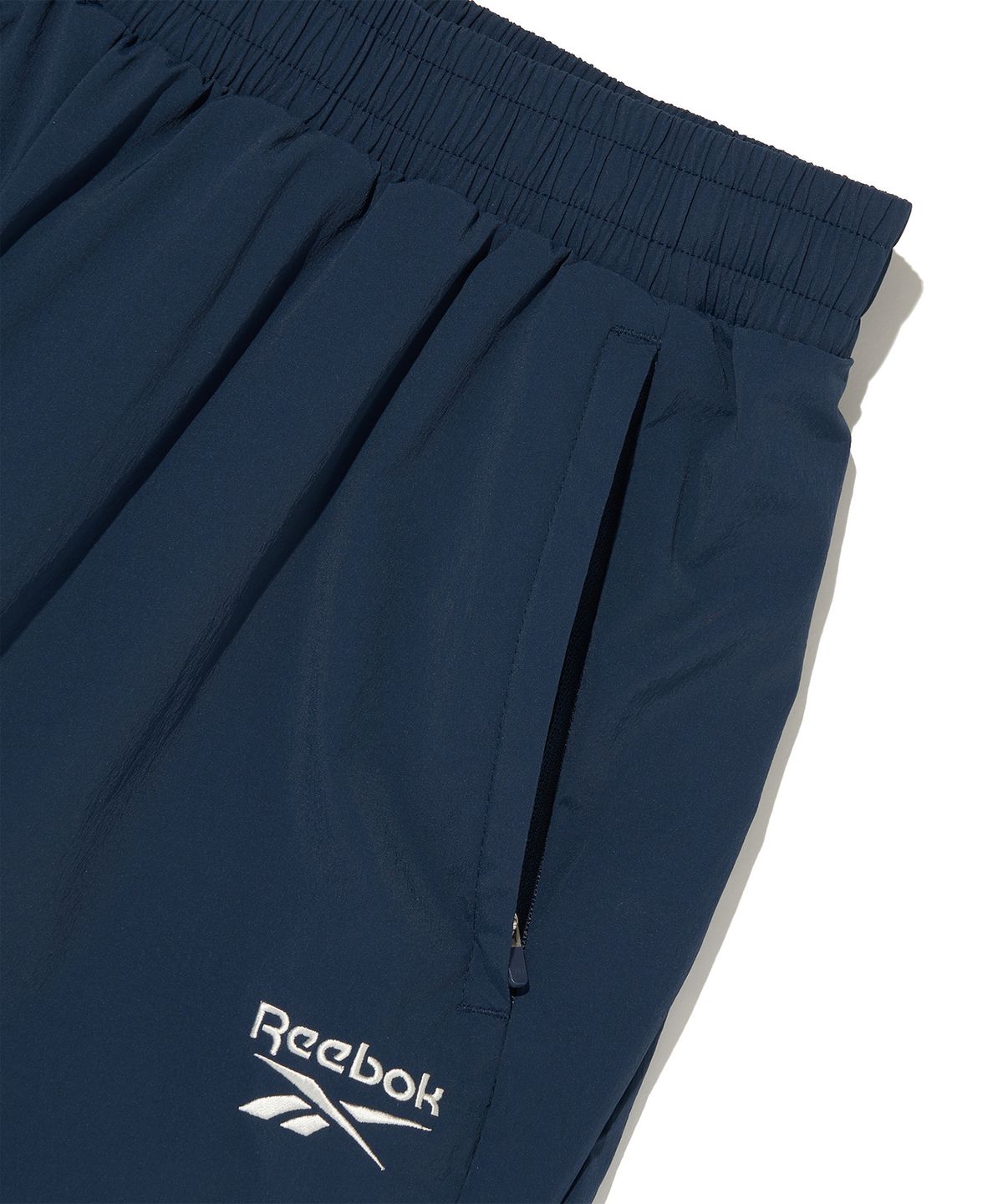 리복(REEBOK) 플로우 웜업 조거 팬츠 - 네이비