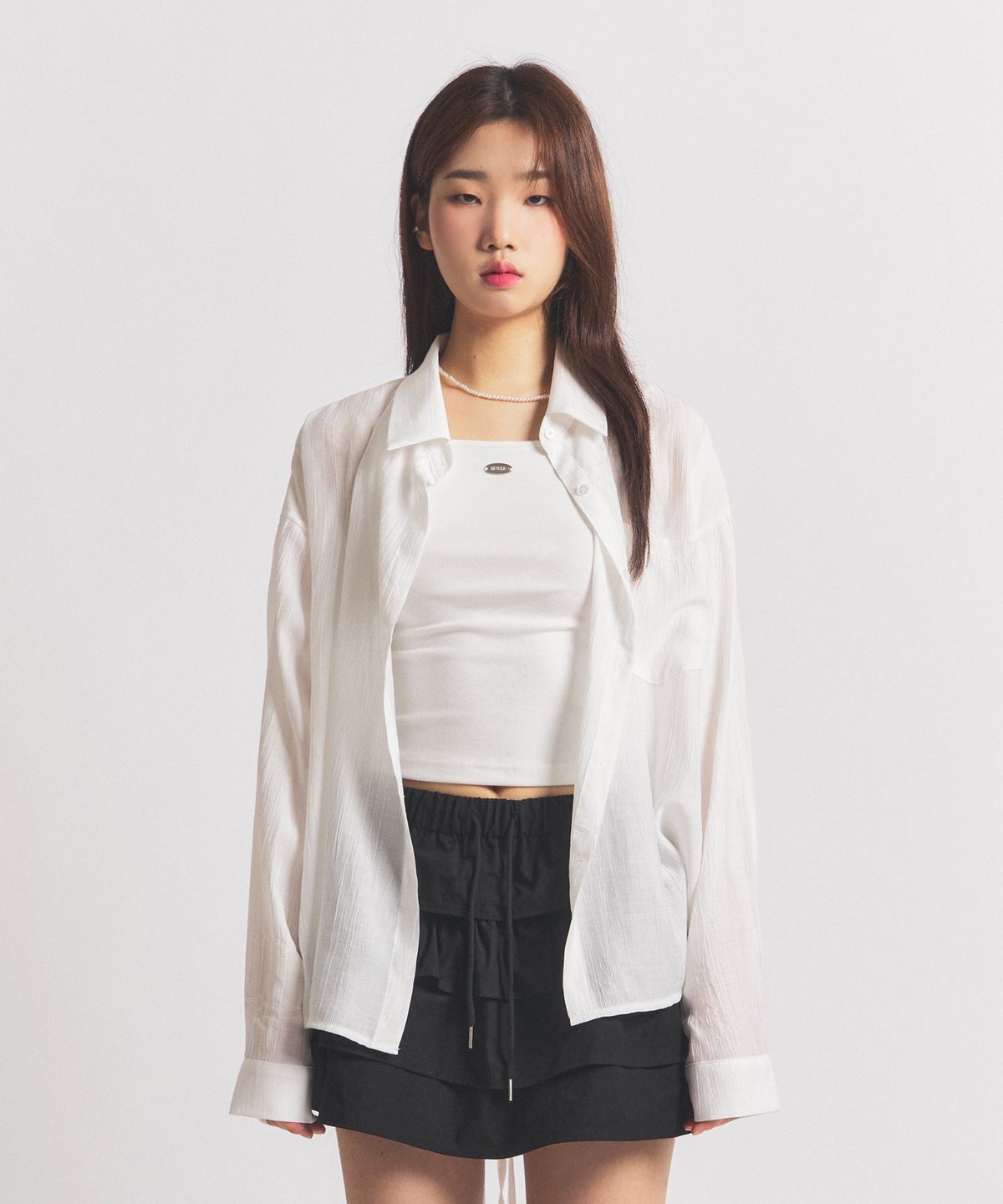 닐라이즈(NEALIZE) Ribbon Oversized See-through Shirt White