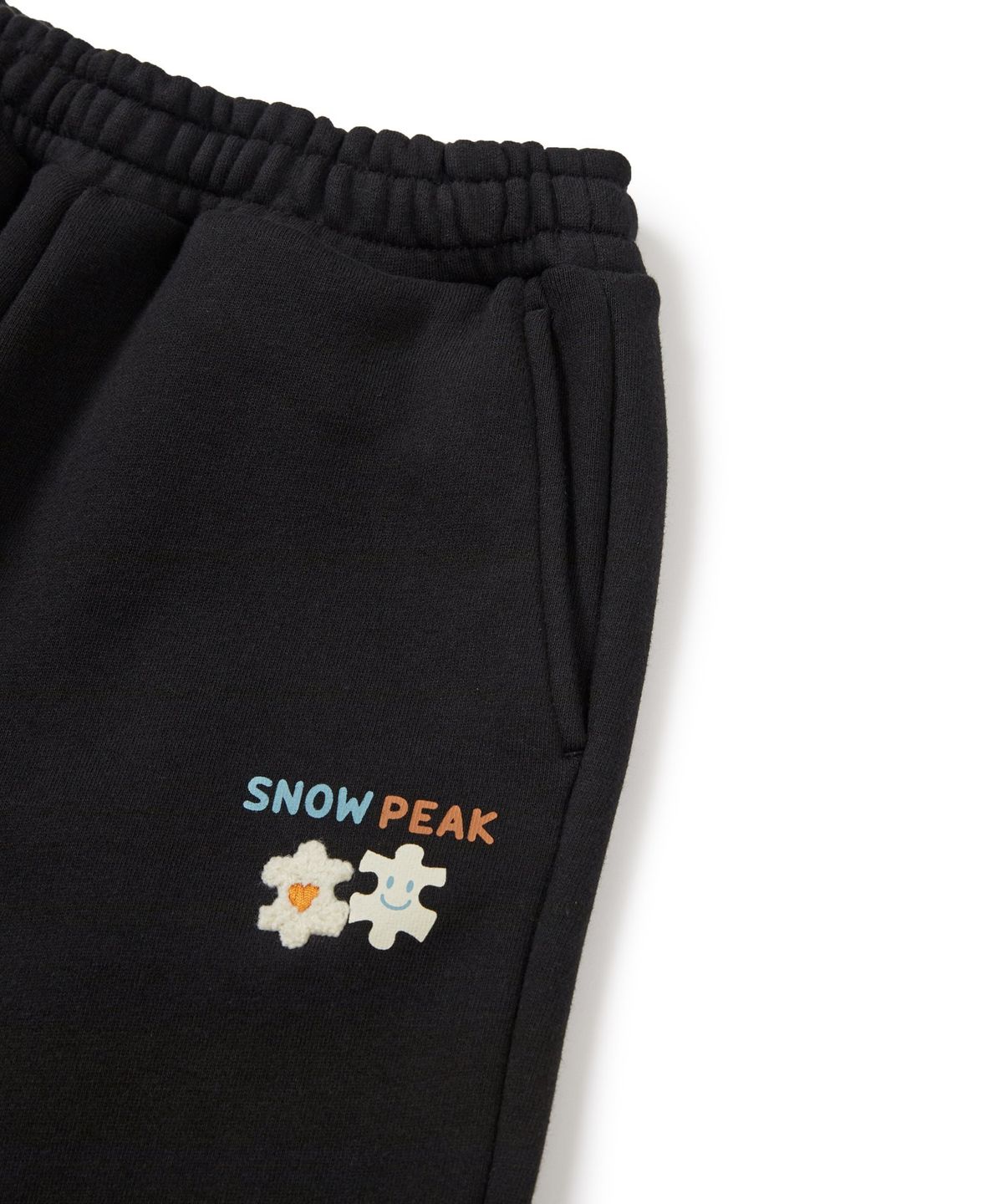 스노우피크 어패럴 키즈(SNOWPEAK APPAREL KIDS) 키즈 그래픽 조거 팬츠 (S24FKFFP80) Black