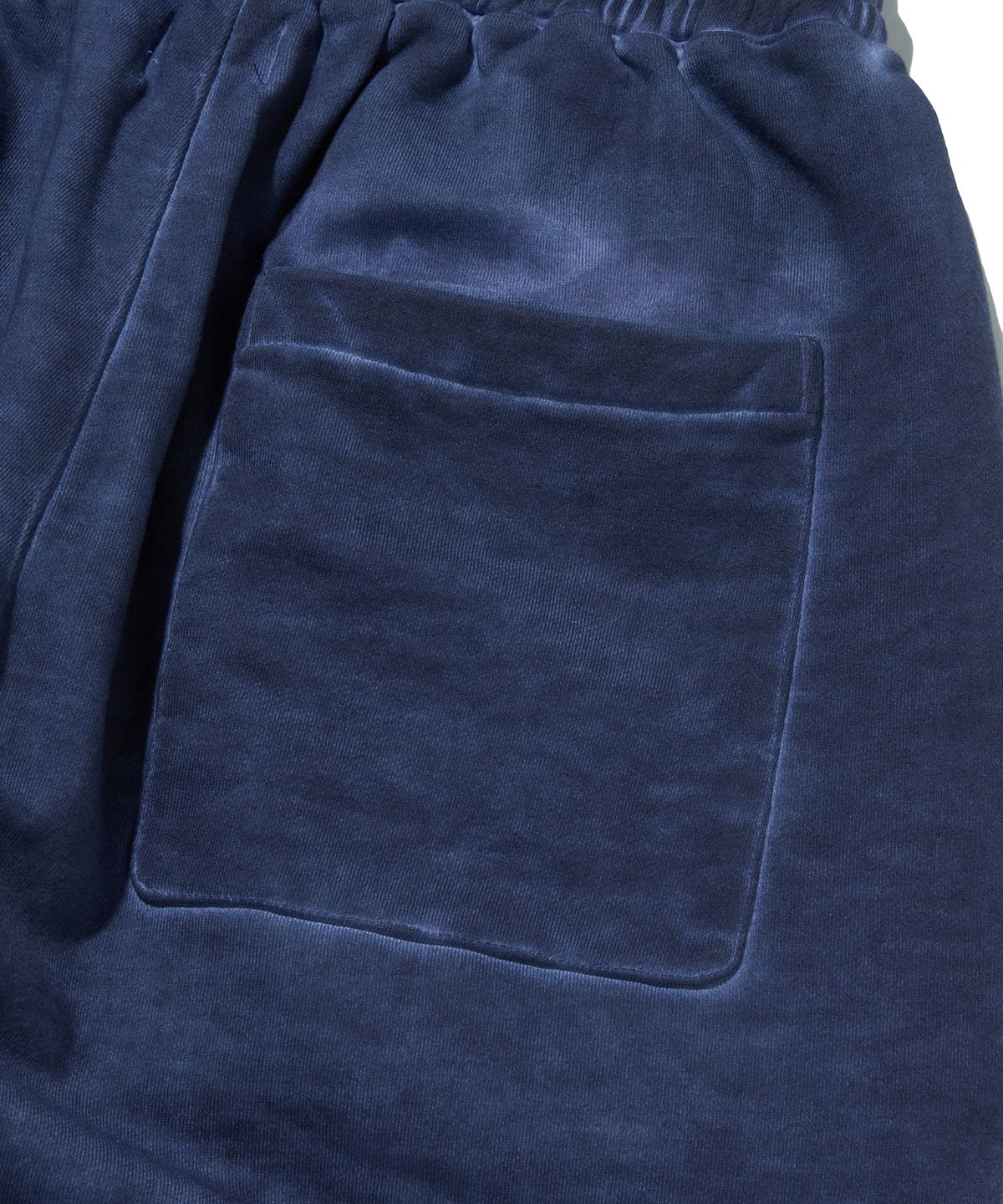 스웨이드(SUADE) CUT OUT SWEAT PANTS [NAVY]
