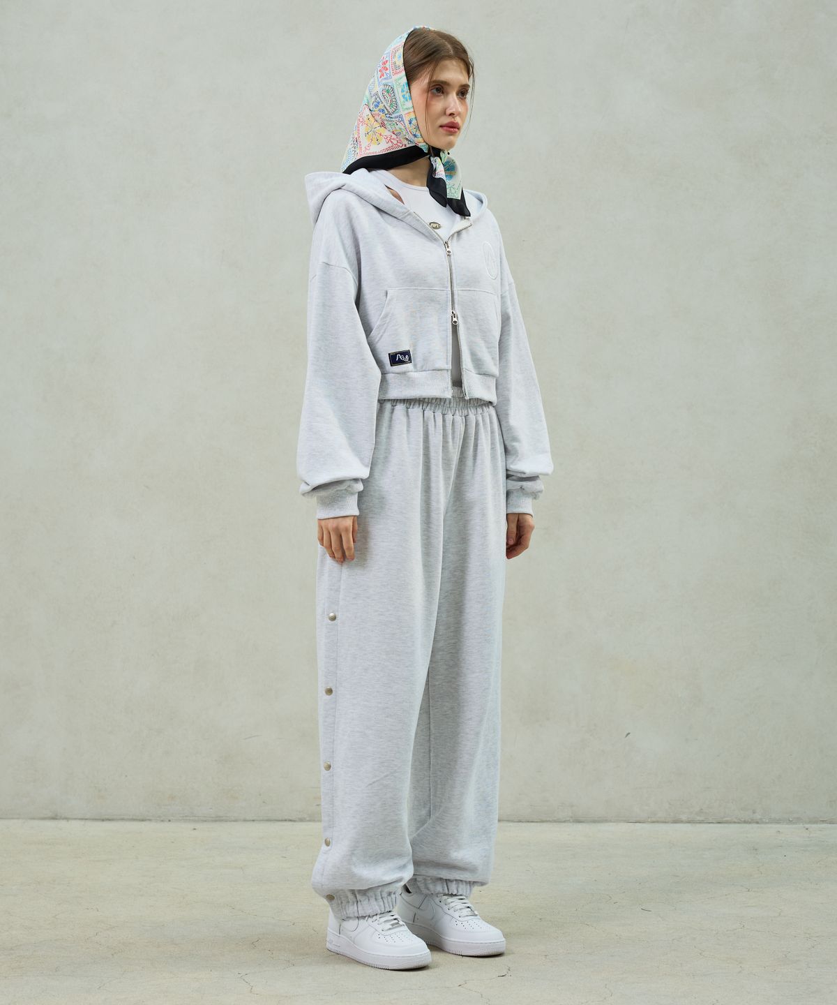 아리킴(ARIKIM) PITA SNAP OFF SWEAT PANTS / WHITE-MELANGE
