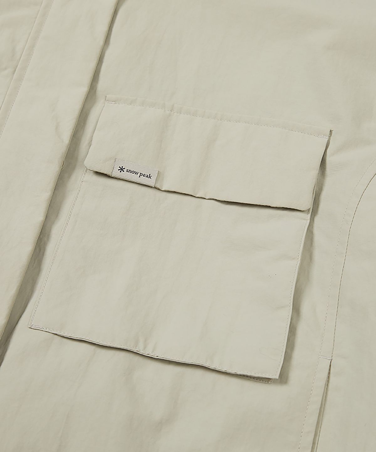 스노우피크 어패럴(SNOWPEAK APPAREL) 캠플 여성 바람막이 (S24FWCWB13) Light Beige