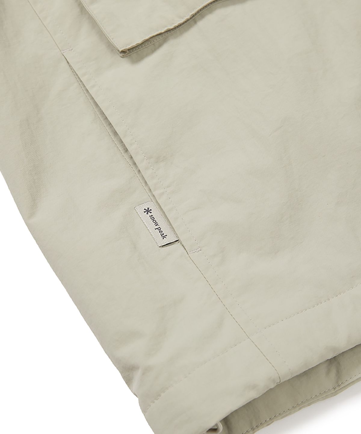 스노우피크 어패럴(SNOWPEAK APPAREL) 캠플 여성 바람막이 (S24FWCWB13) Light Beige