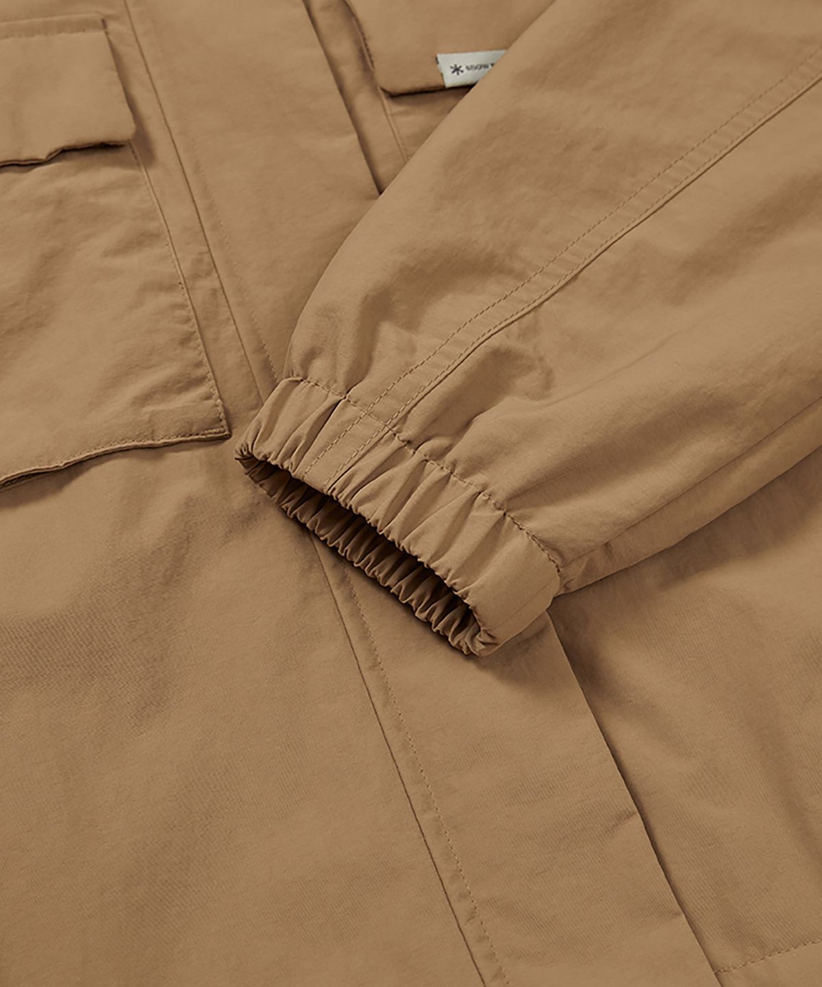 스노우피크 어패럴(SNOWPEAK APPAREL) 캠플 여성 바람막이 (S24FWCWB13) Camel