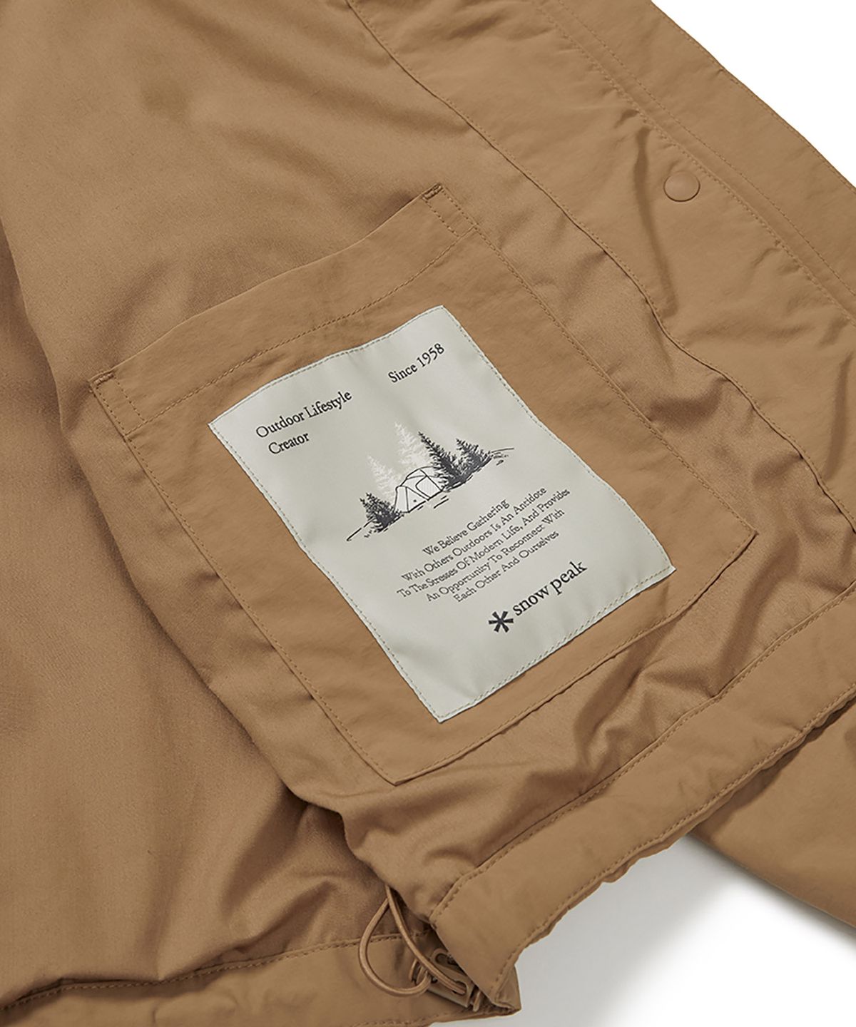 스노우피크 어패럴(SNOWPEAK APPAREL) 캠플 여성 바람막이 (S24FWCWB13) Camel