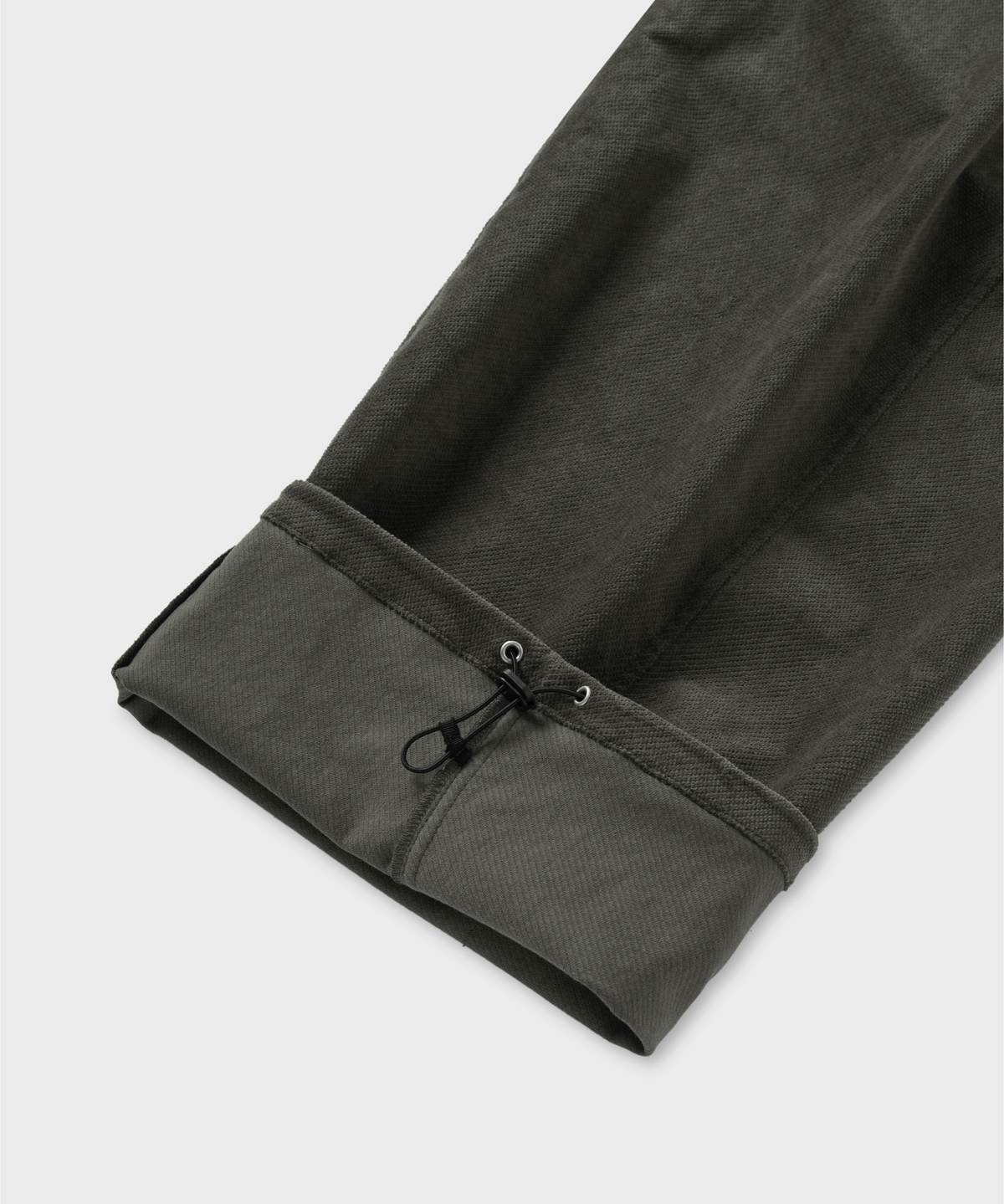 넌블랭크(NONBLANK) 원턱 커브드 스티치 팬츠_KHAKI